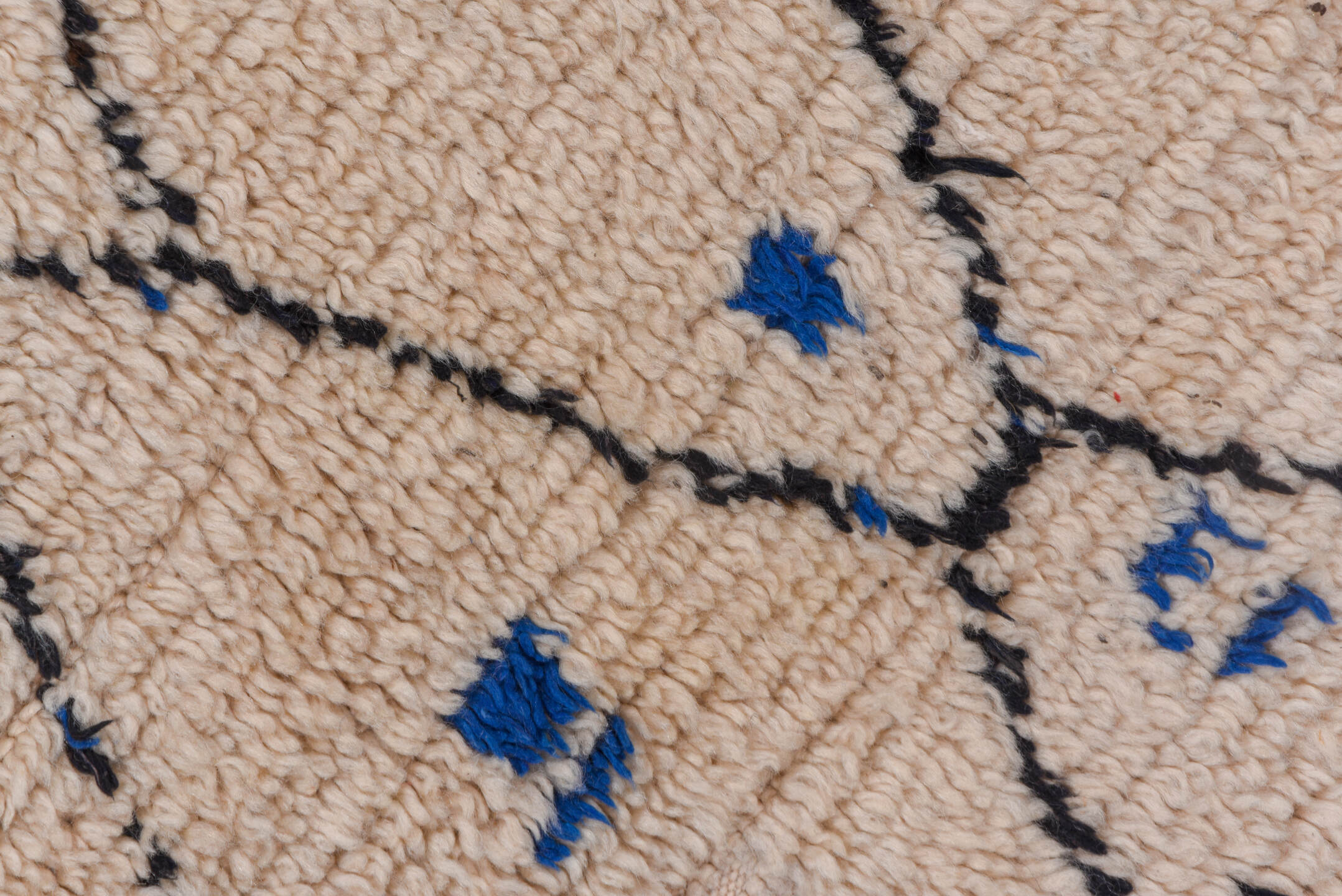 4' x 9' one-of-a-kind handmade vintage Moroccan runner rug. Color palette: ivory, charcoal, cobalt, crimson, gray, black
