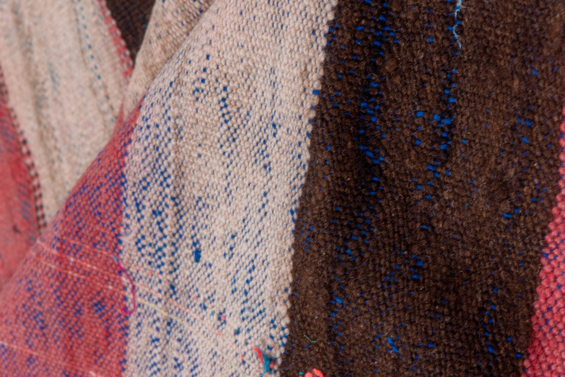 4' x 7' one-of-a-kind handmade vintage Moroccan rug. Color palette: rose, ivory, dark brown, burgundy, indigo, teal, pink