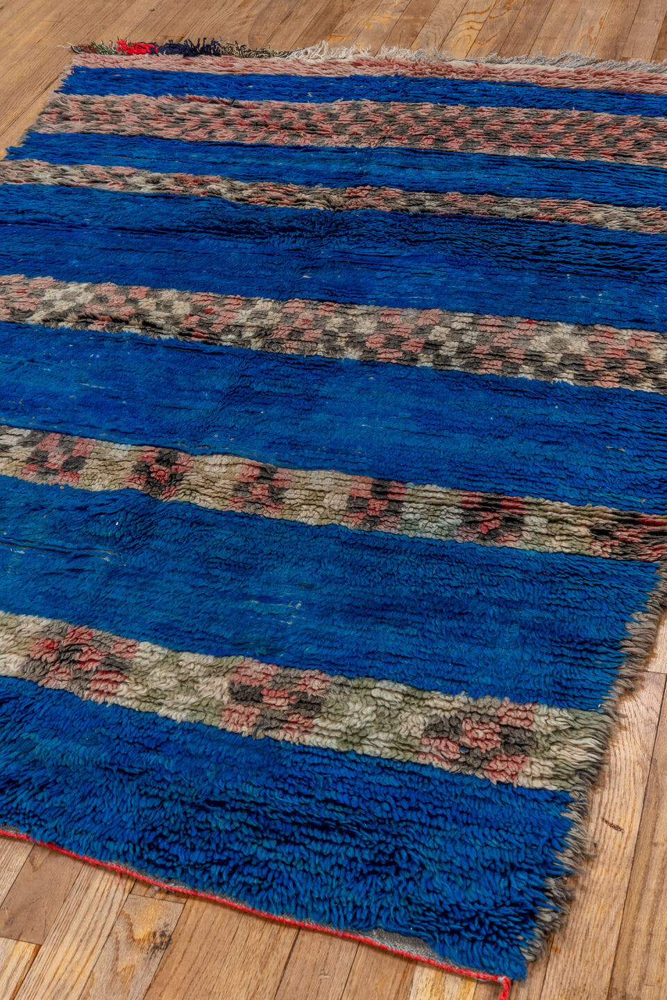 4' x 6' one-of-a-kind handmade vintage Moroccan small size rug. Color palette: cobalt, ivory, blush, charcoal, red, cream