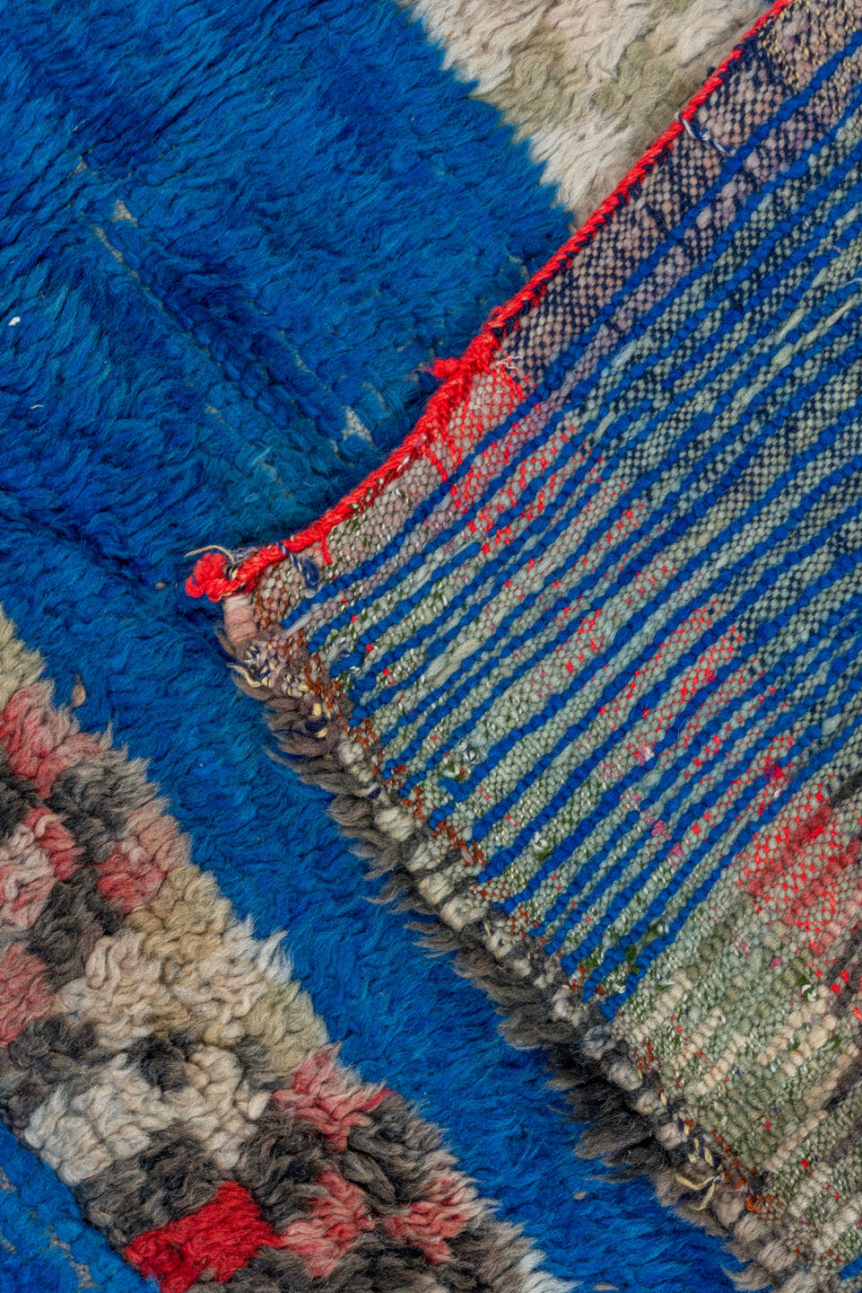 4' x 6' one-of-a-kind handmade vintage Moroccan small size rug. Color palette: cobalt, ivory, blush, charcoal, red, cream
