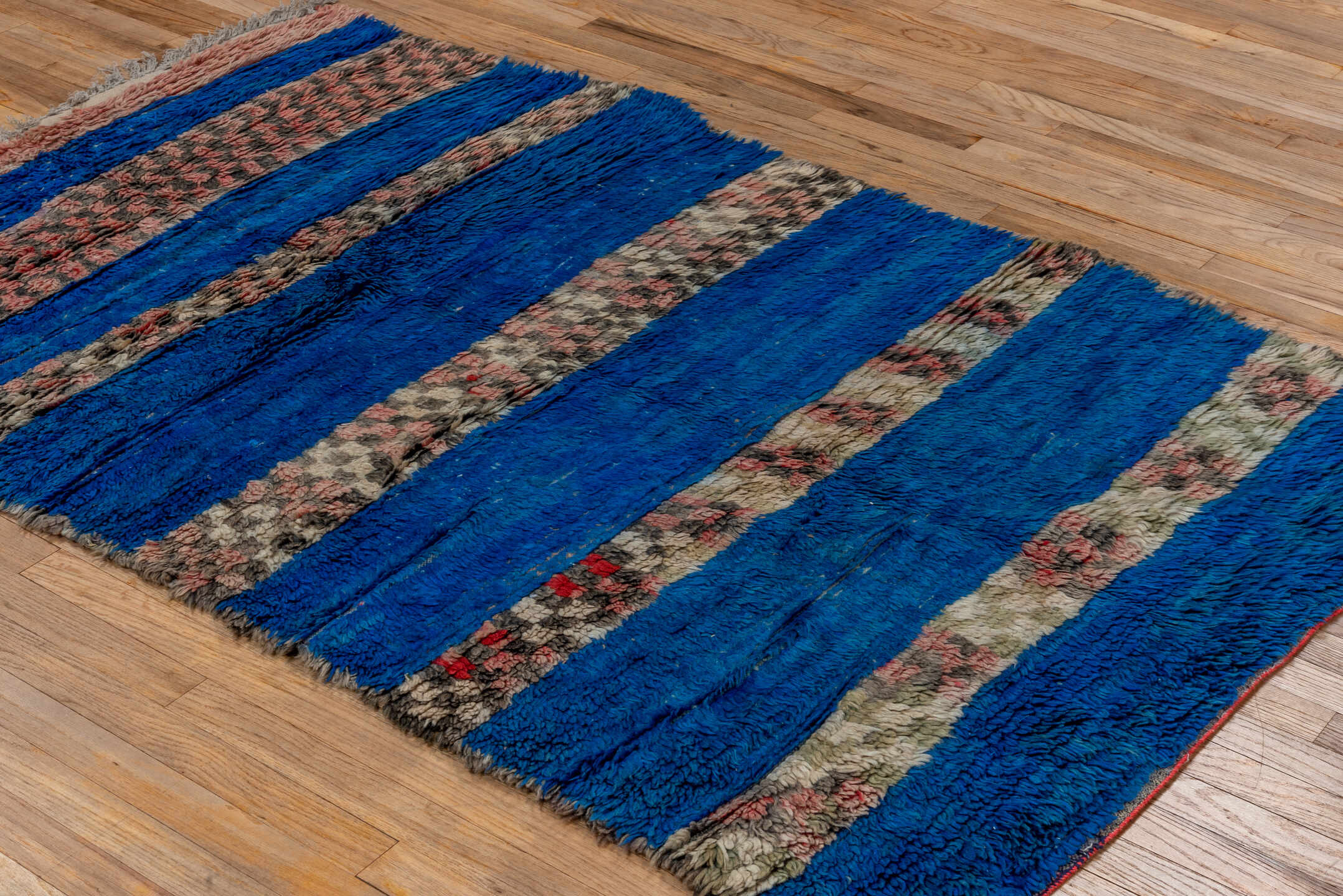 4' x 6' one-of-a-kind handmade vintage Moroccan small size rug. Color palette: cobalt, ivory, blush, charcoal, red, cream