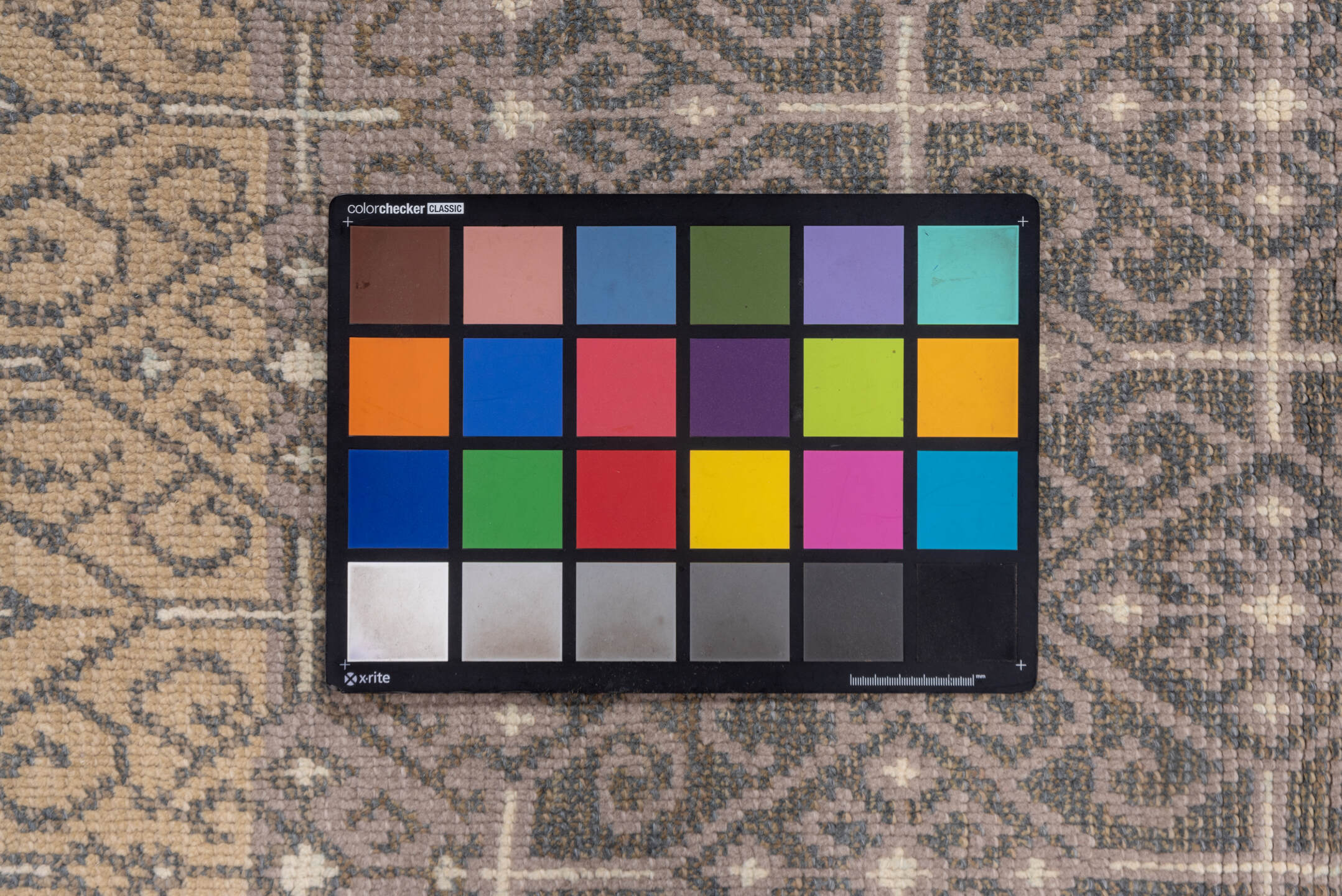 2' x 4' one-of-a-kind handmade vintage Konya small size rug. Color palette: brown, gray, light gray, off-white, pink, snow