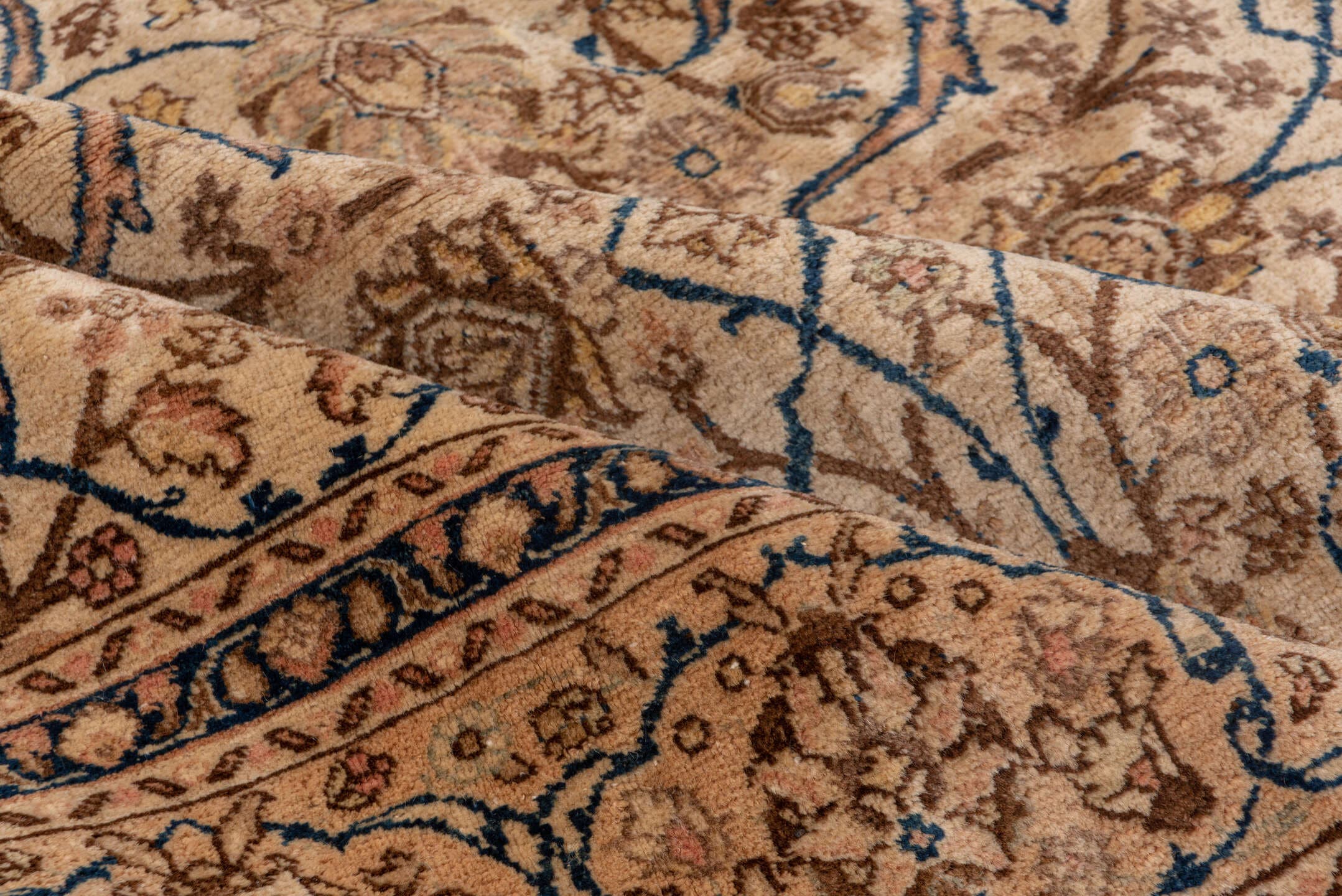 6' x 9' one-of-a-kind handmade antique Tabriz medium size rug. Color palette: ivory, camel, taupe, navy, beige, brown