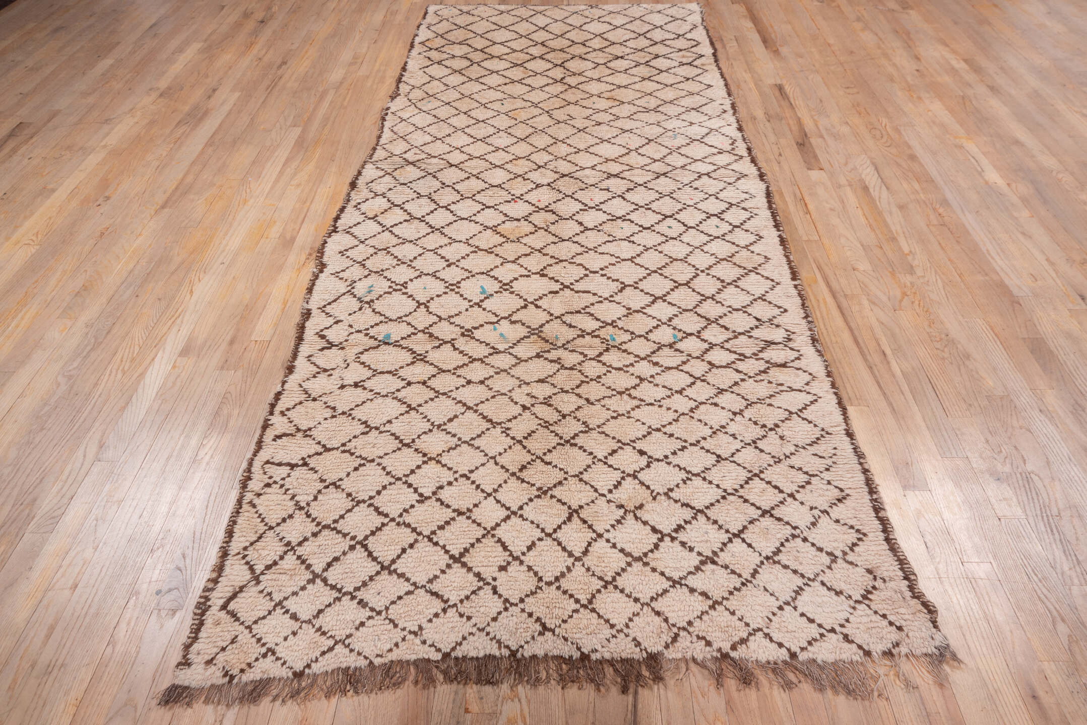 4' x 12' one-of-a-kind handmade vintage Moroccan runner rug. Color palette: brown, gray, light gray, off-white, orange, pink