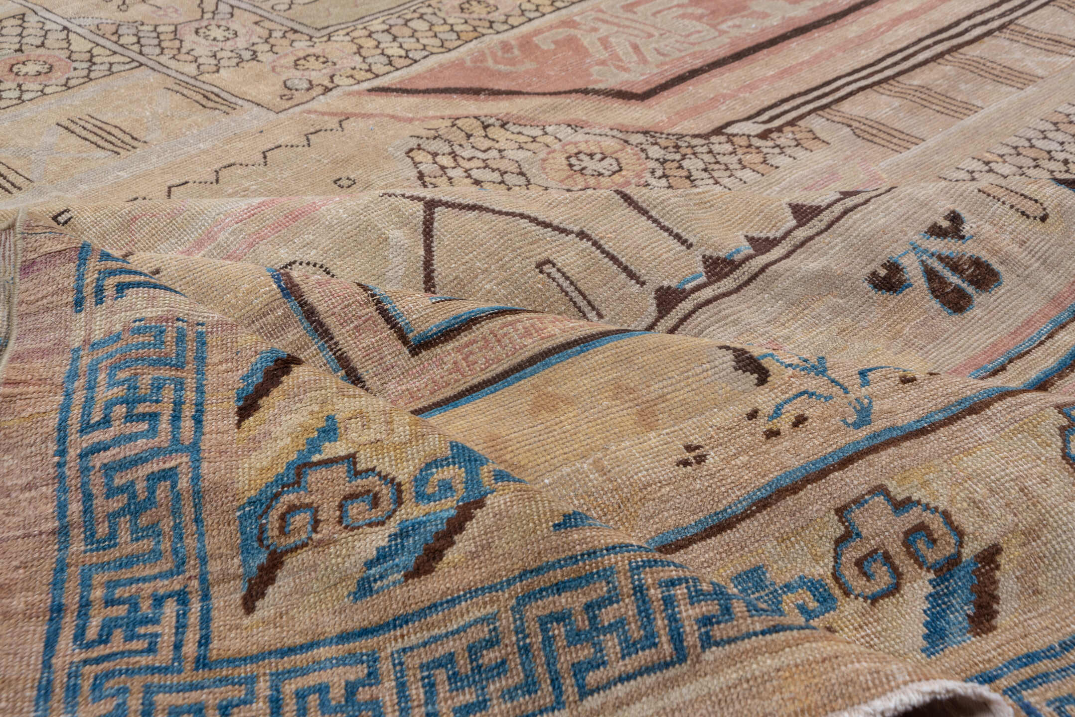12' x 13' one-of-a-kind handmade antique Khotan oversize rug. Color palette: camel, taupe, brown, rose, ivory, slate, blue