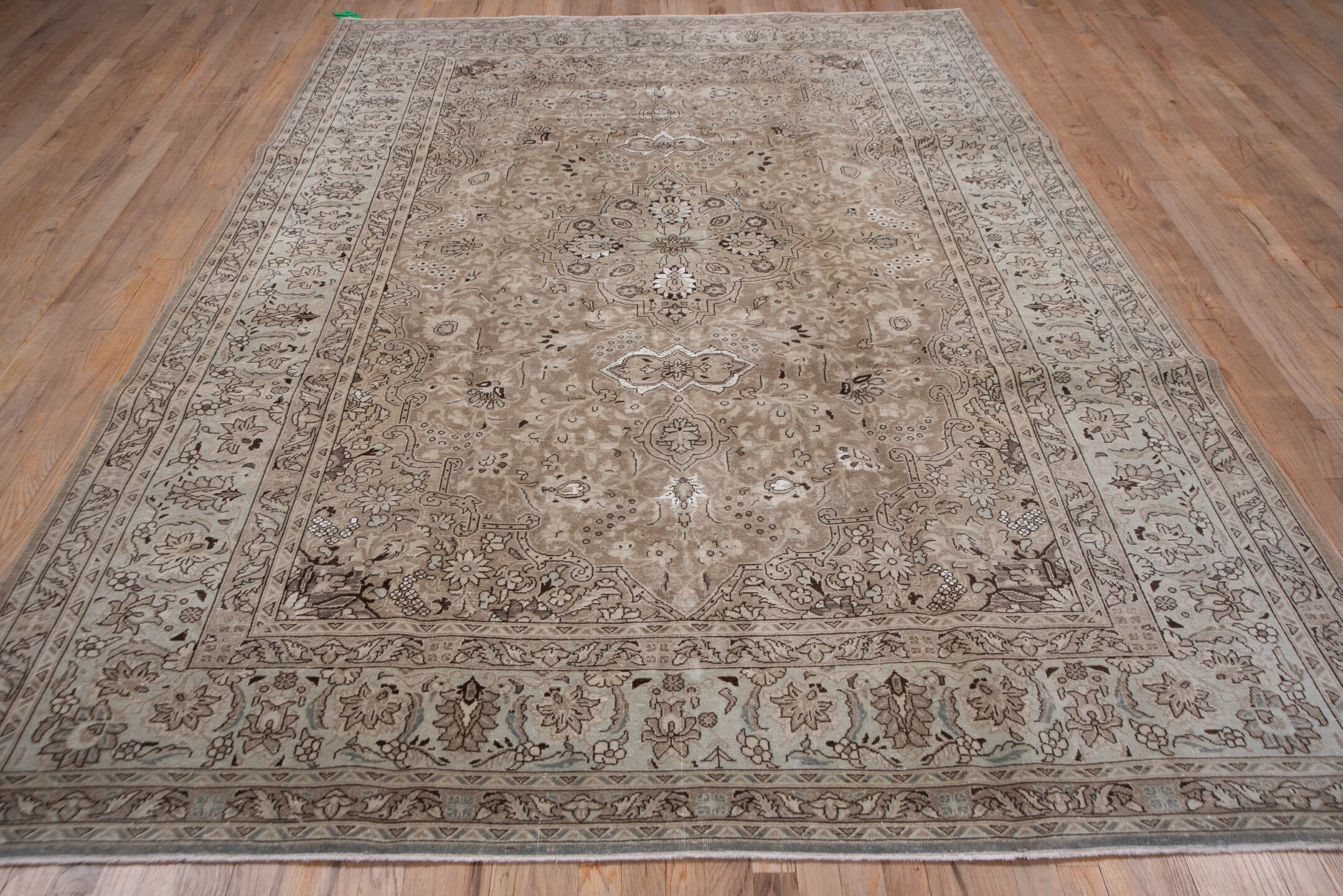 7' x 10' one-of-a-kind handmade antique Sivas large size rug. Color palette: taupe, ivory, beige, brown, camel, charcoal