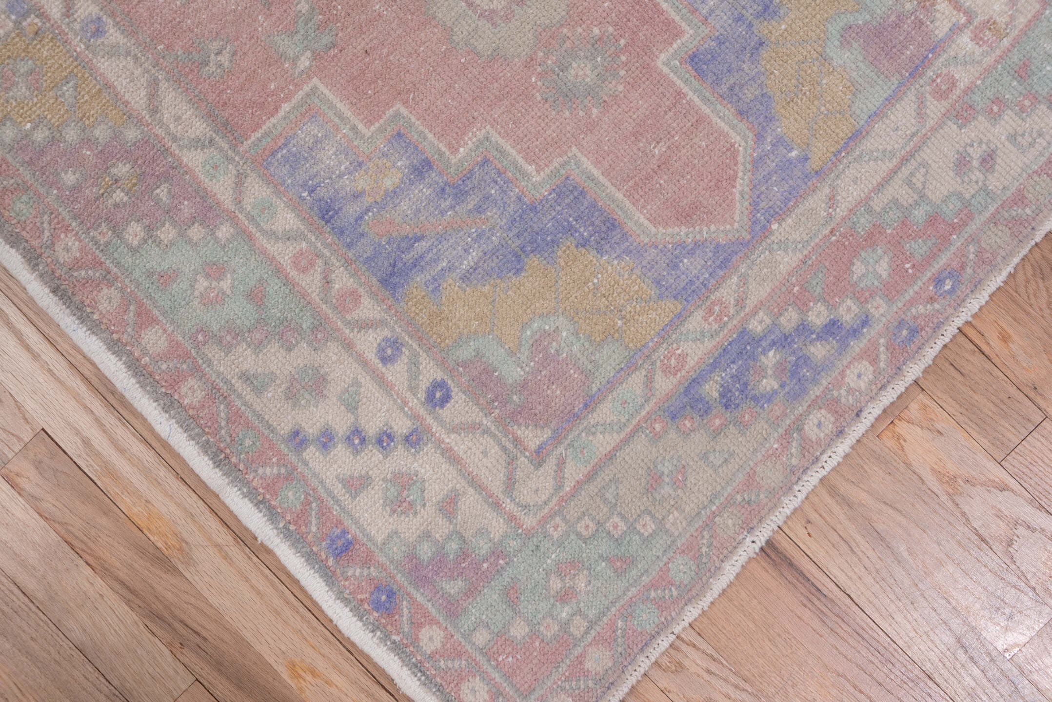 3' x 10' one-of-a-kind handmade vintage Oushak runner rug. Color palette: rose, taupe, ivory, lavender, sage, dusty blue