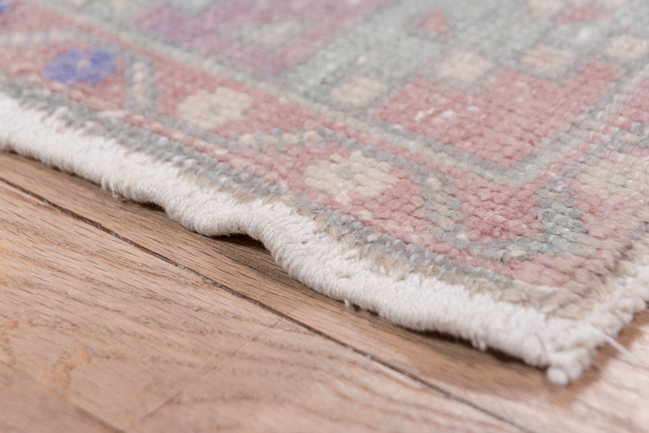 3' x 10' one-of-a-kind handmade vintage Oushak runner rug. Color palette: rose, taupe, ivory, lavender, sage, dusty blue