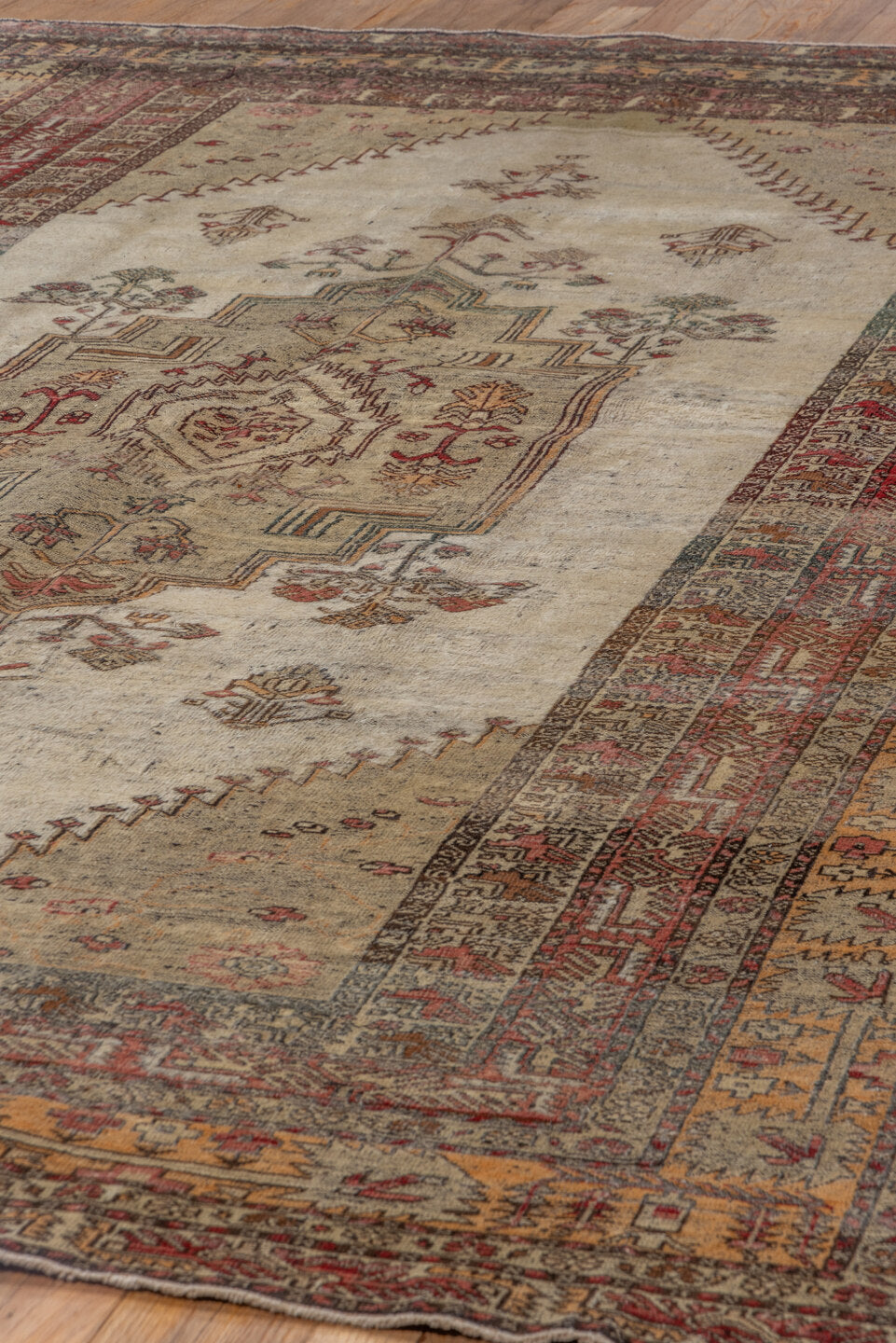 6' x 9' one-of-a-kind handmade vintage Oushak medium size rug. Color palette: ivory, rust, burgundy, taupe, gold, brown
