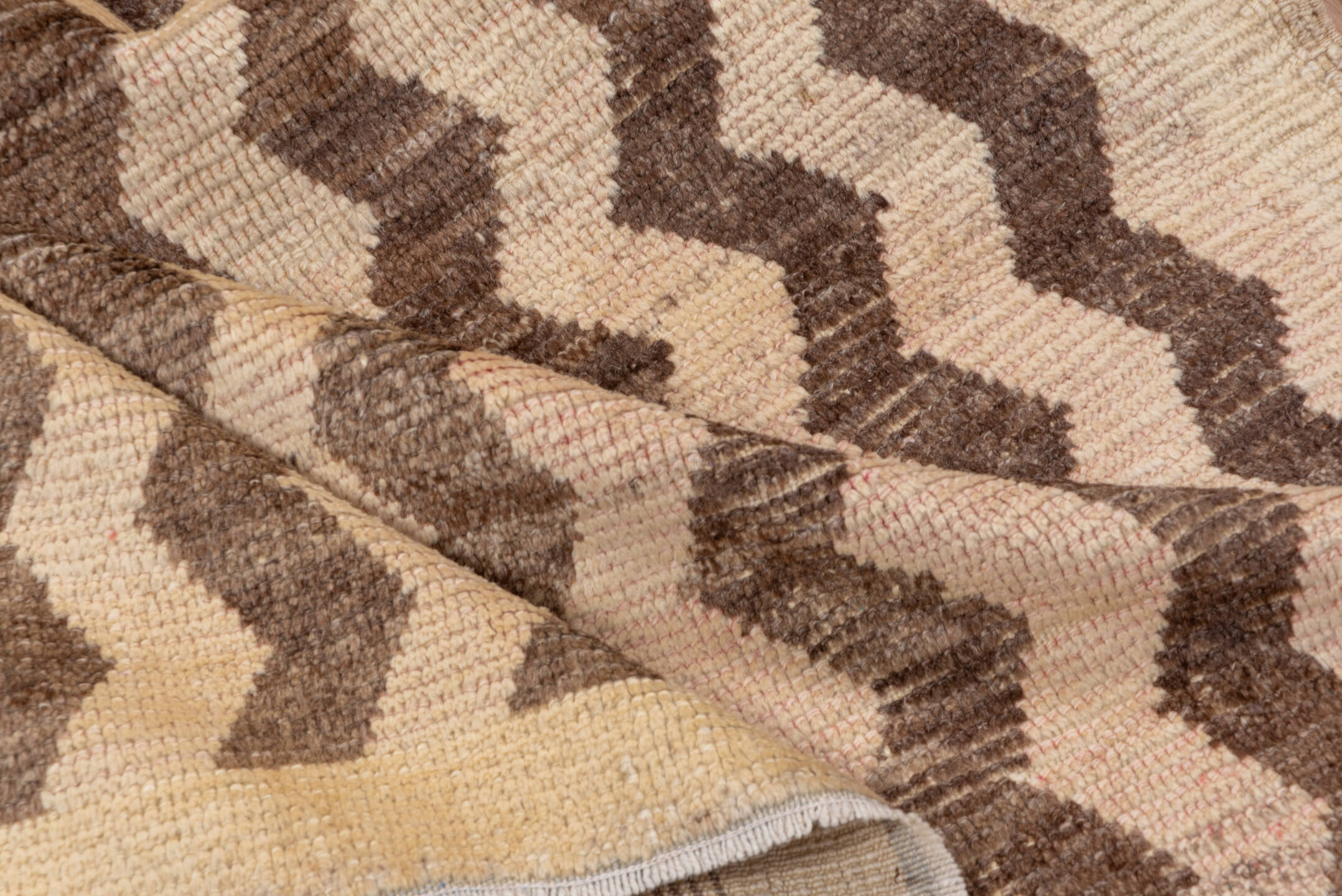 3' x 6' one-of-a-kind handmade vintage Tulu small size rug. Color palette: brown, gray, light gray, off-white, orange, pink