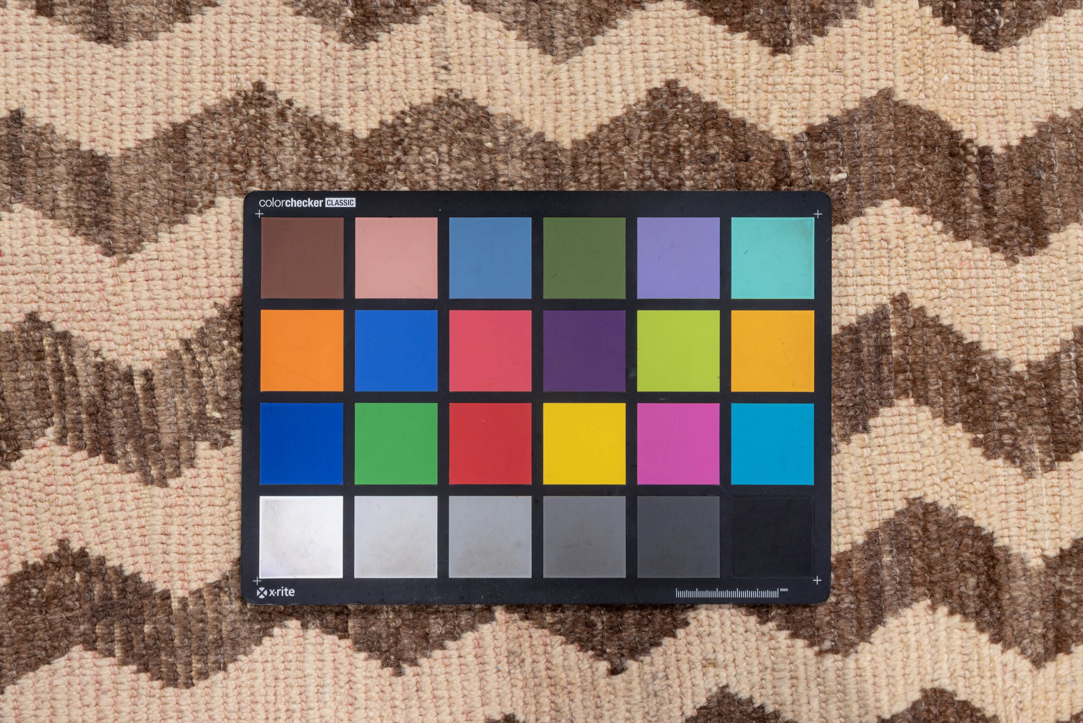 3' x 6' one-of-a-kind handmade vintage Tulu small size rug. Color palette: brown, gray, light gray, off-white, orange, pink