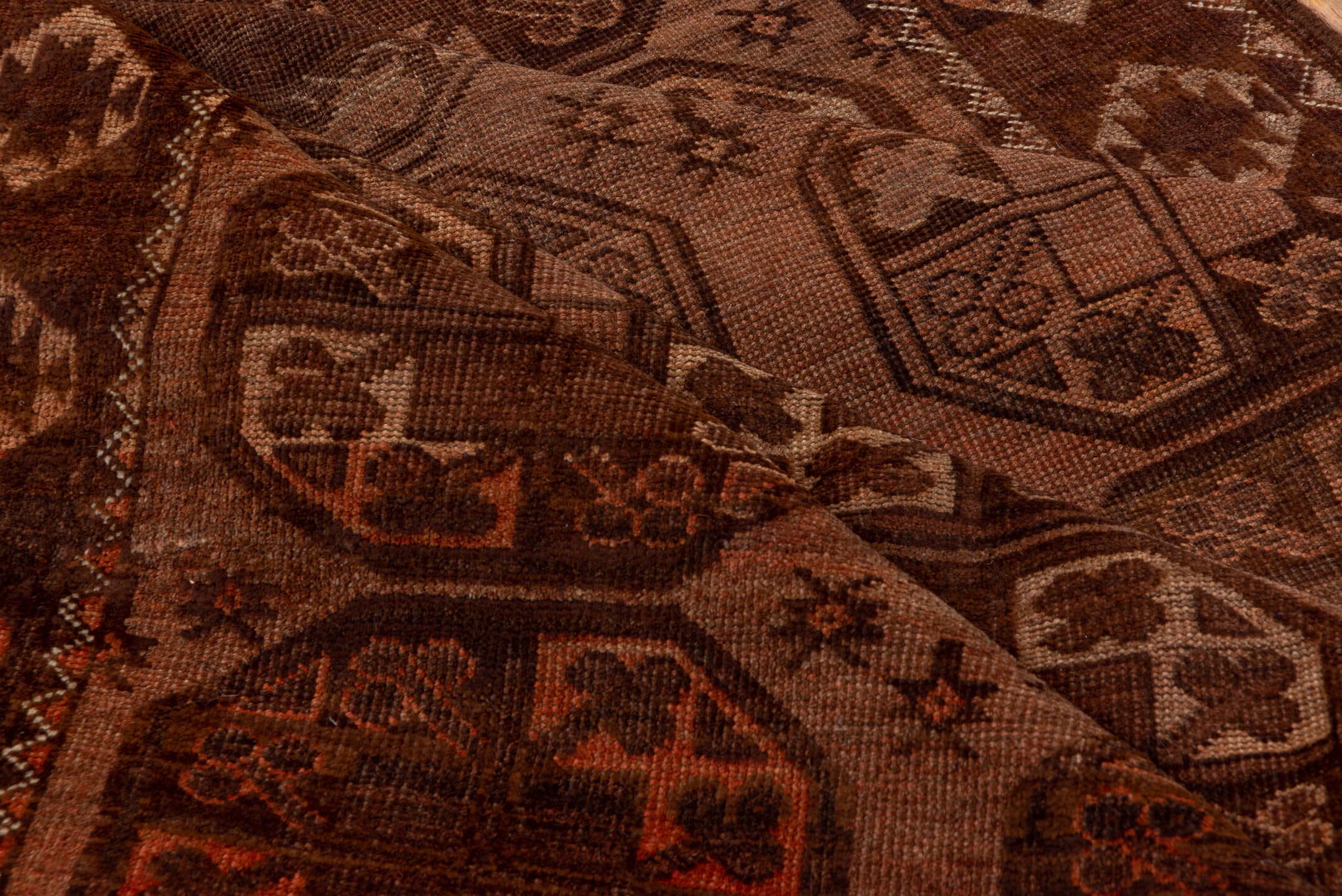 4' x 7' one-of-a-kind handmade antique Afghan rug. Color palette: brown, rust, camel, mahogany, taupe, terra cotta, charcoal