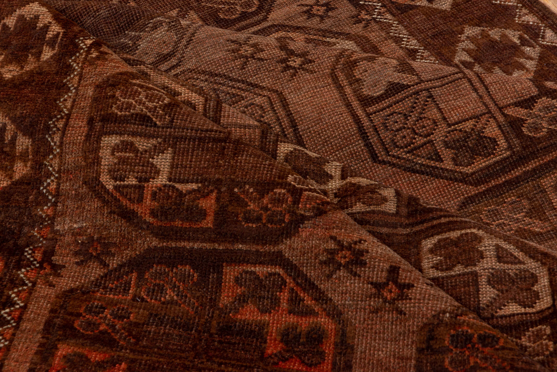 4' x 7' one-of-a-kind handmade antique Afghan rug. Color palette: brown, rust, camel, mahogany, taupe, terra cotta, charcoal