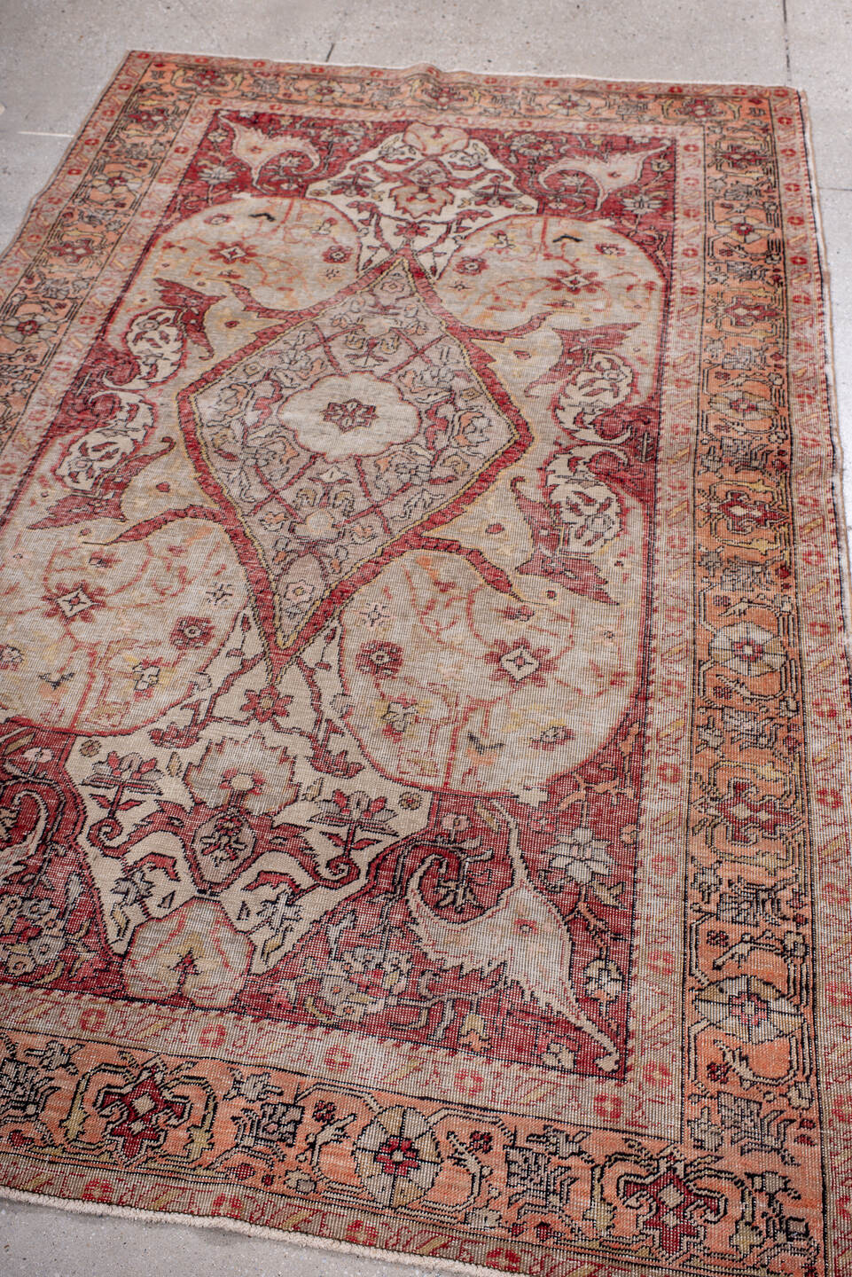 4' x 7' one-of-a-kind handmade vintage Oushak rug. Color palette: ivory, rose, rust, peach, blush, taupe, gold, charcoal