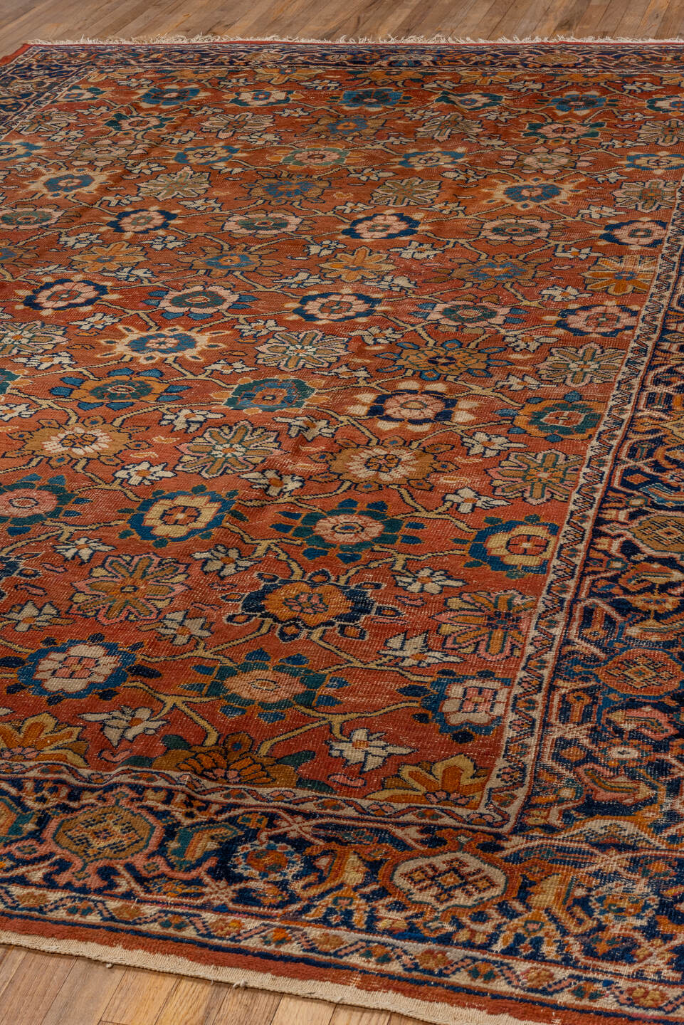 7' x 11' one-of-a-kind handmade vintage Mahal large size rug. Color palette: terra cotta, navy, ivory, sky blue, camel, gold