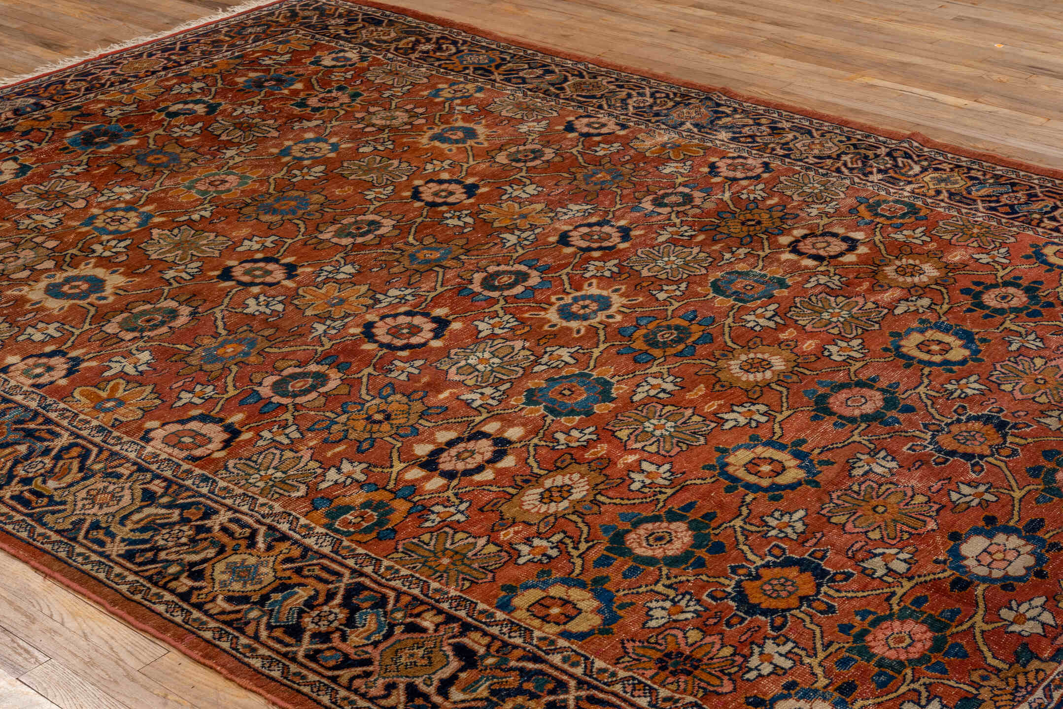 7' x 11' one-of-a-kind handmade vintage Mahal large size rug. Color palette: terra cotta, navy, ivory, sky blue, camel, gold