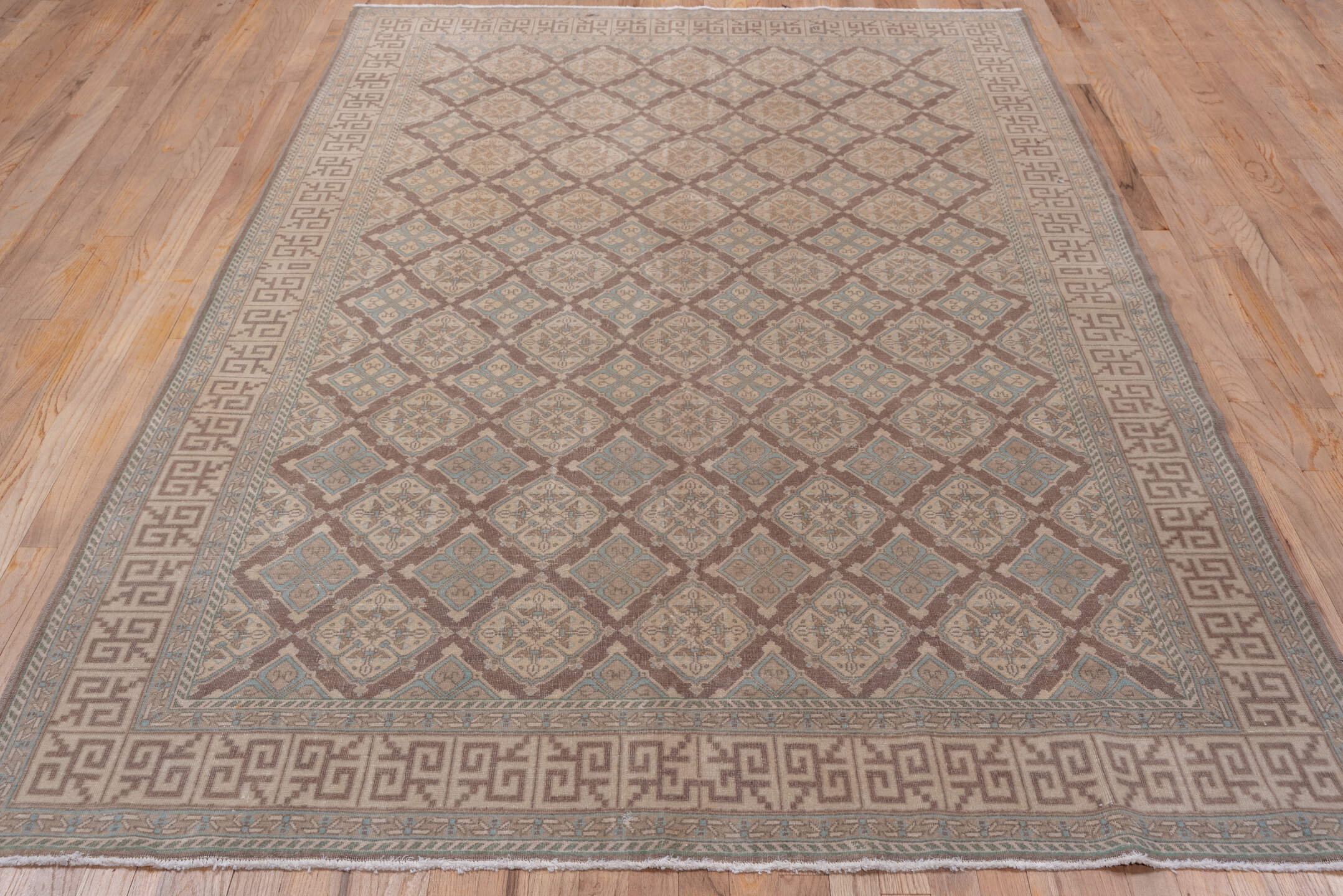 5' x 8' one-of-a-kind handmade vintage Sivas medium size rug. Color palette: taupe, camel, brown, dusty blue, ivory, rose