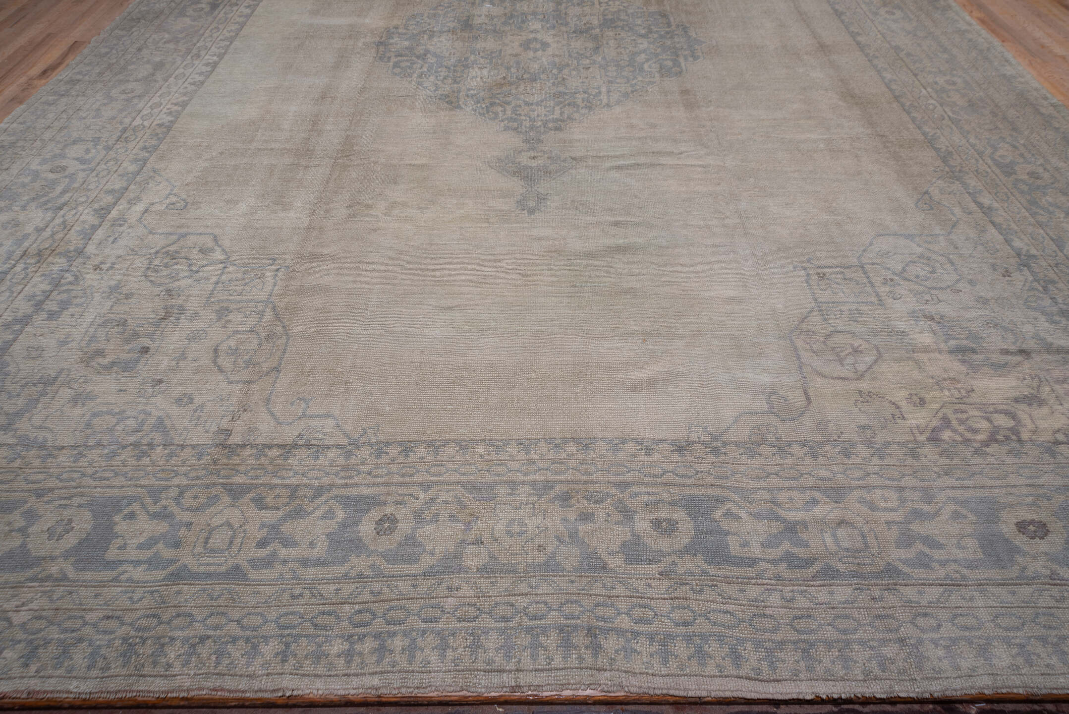 14' x 19' one-of-a-kind handmade antique Oushak oversize rug. Color palette: ivory, beige, taupe, slate, gray, cream