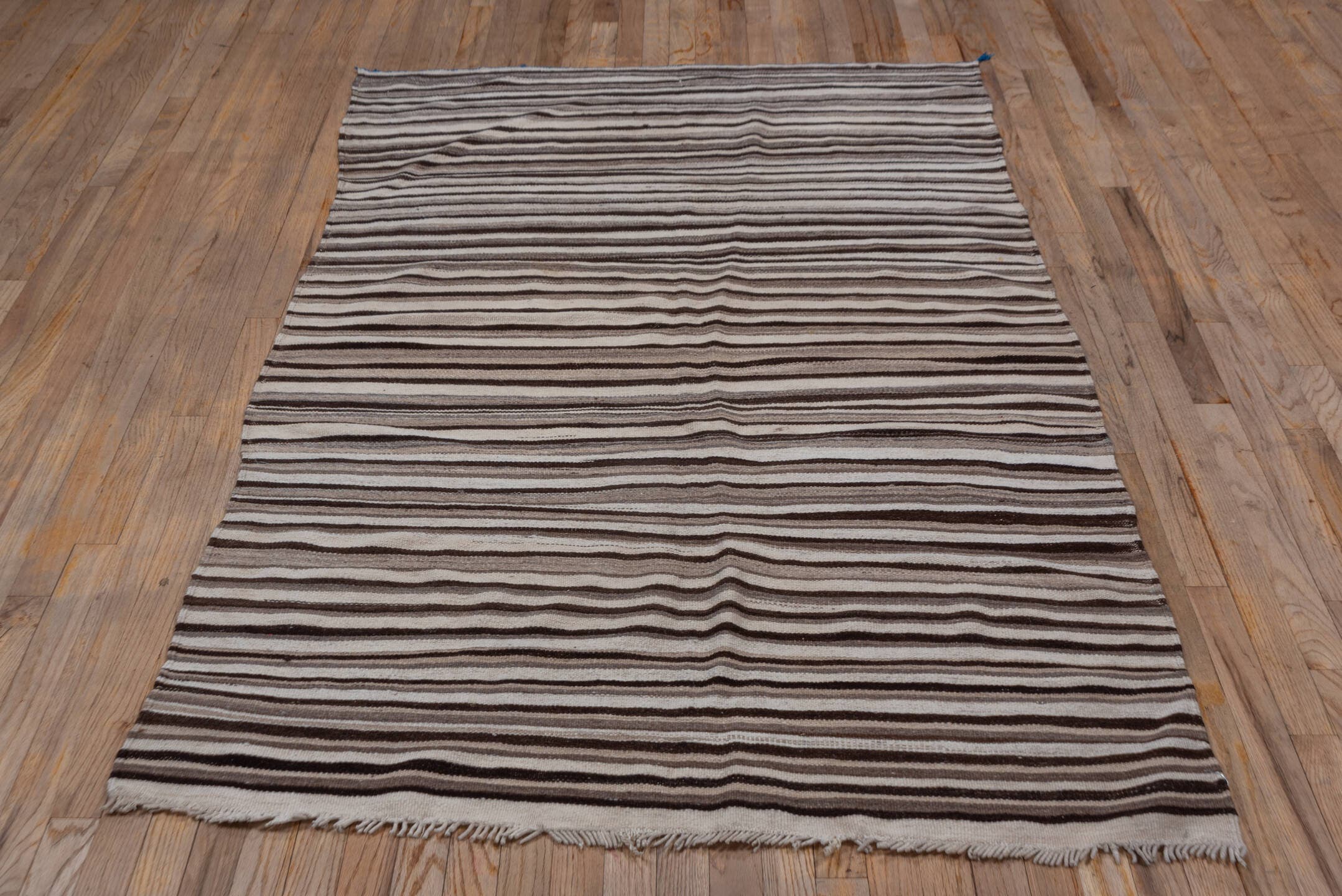 4' x 6' one-of-a-kind handmade vintage Blanket small size rug. Color palette: ivory, taupe, brown, charcoal, beige, gray