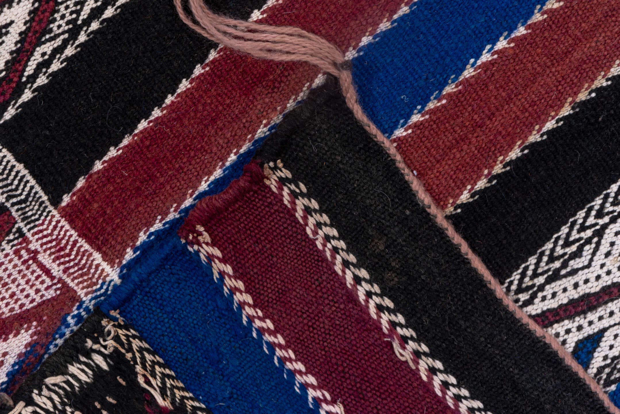 5' x 11' one-of-a-kind handmade vintage Kilim runner rug. Color palette: black, burgundy, indigo, ivory, gray, purple