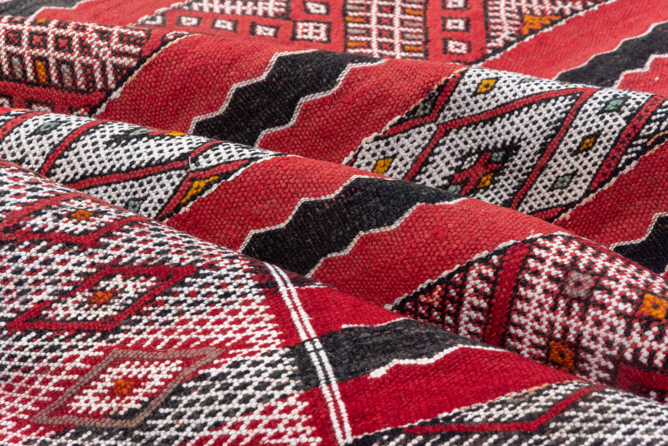 4' x 8' one-of-a-kind handmade vintage Kilim rug. Color palette: red, ivory, charcoal, rust, brown, gray, black, terracotta