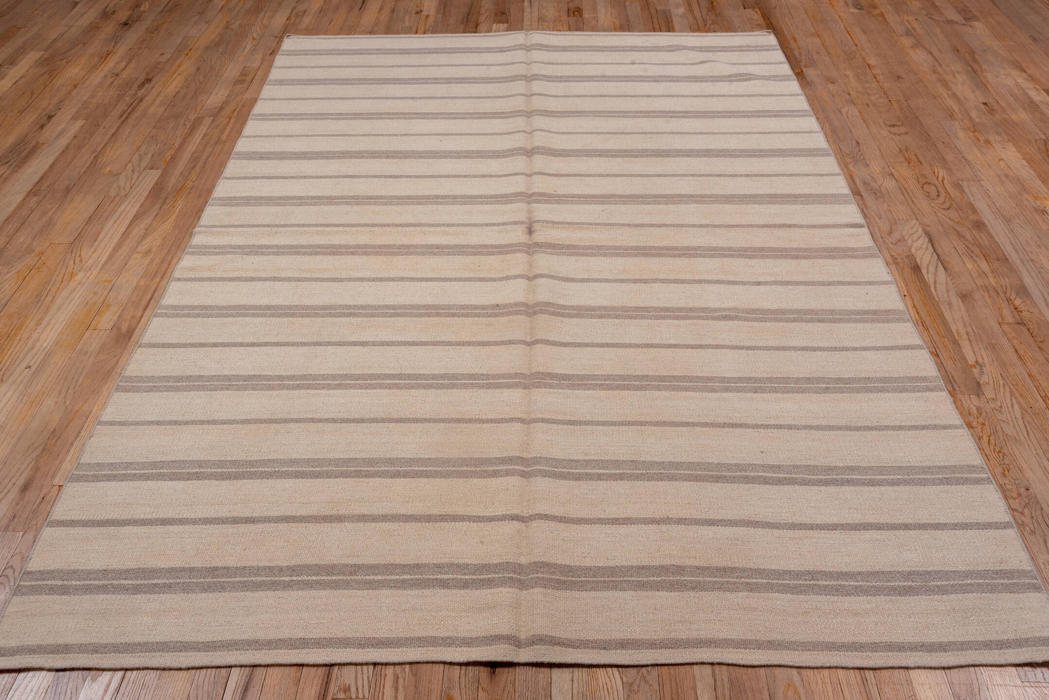 5' x 8' one-of-a-kind handmade vintage Kilim medium size rug. Color palette: brown, gray, light gray, off-white, orange