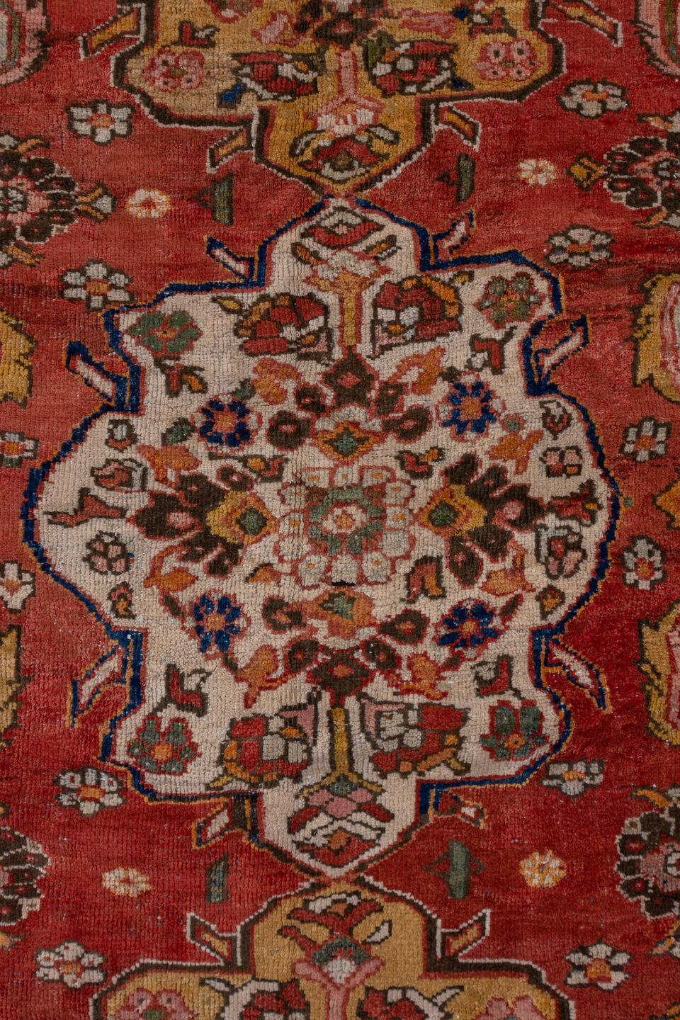 11' x 19' one-of-a-kind handmade antique Sultanabad oversize rug. Color palette: terra cotta, brown, ivory, gold, navy, sage