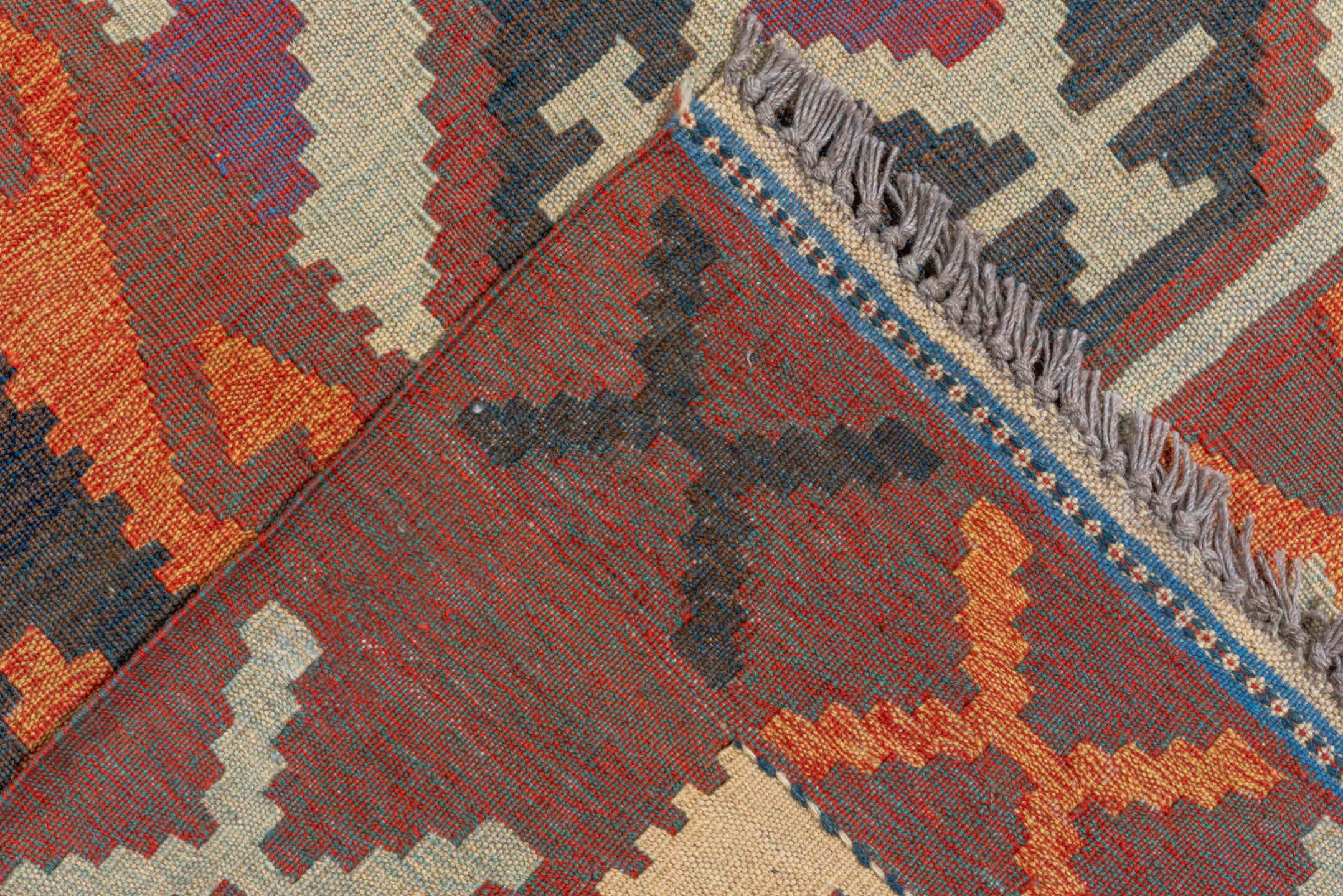 12' x 18' one-of-a-kind handmade vintage Kilim oversize rug. Color palette: brown, gray, orange, pink, red, wine