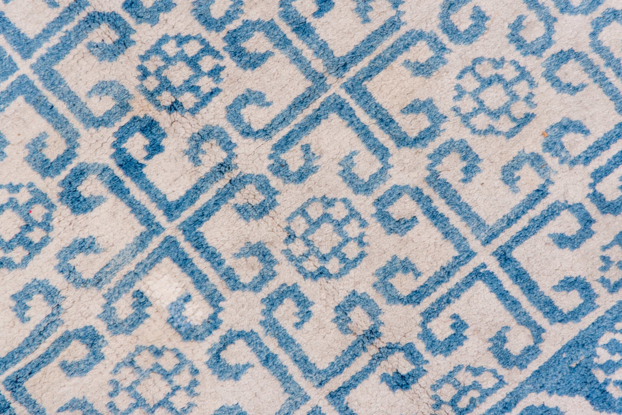 4' x 7' one-of-a-kind handmade vintage Cotton Agra rug. Color palette: ivory, sky blue, azure, slate blue, light blue