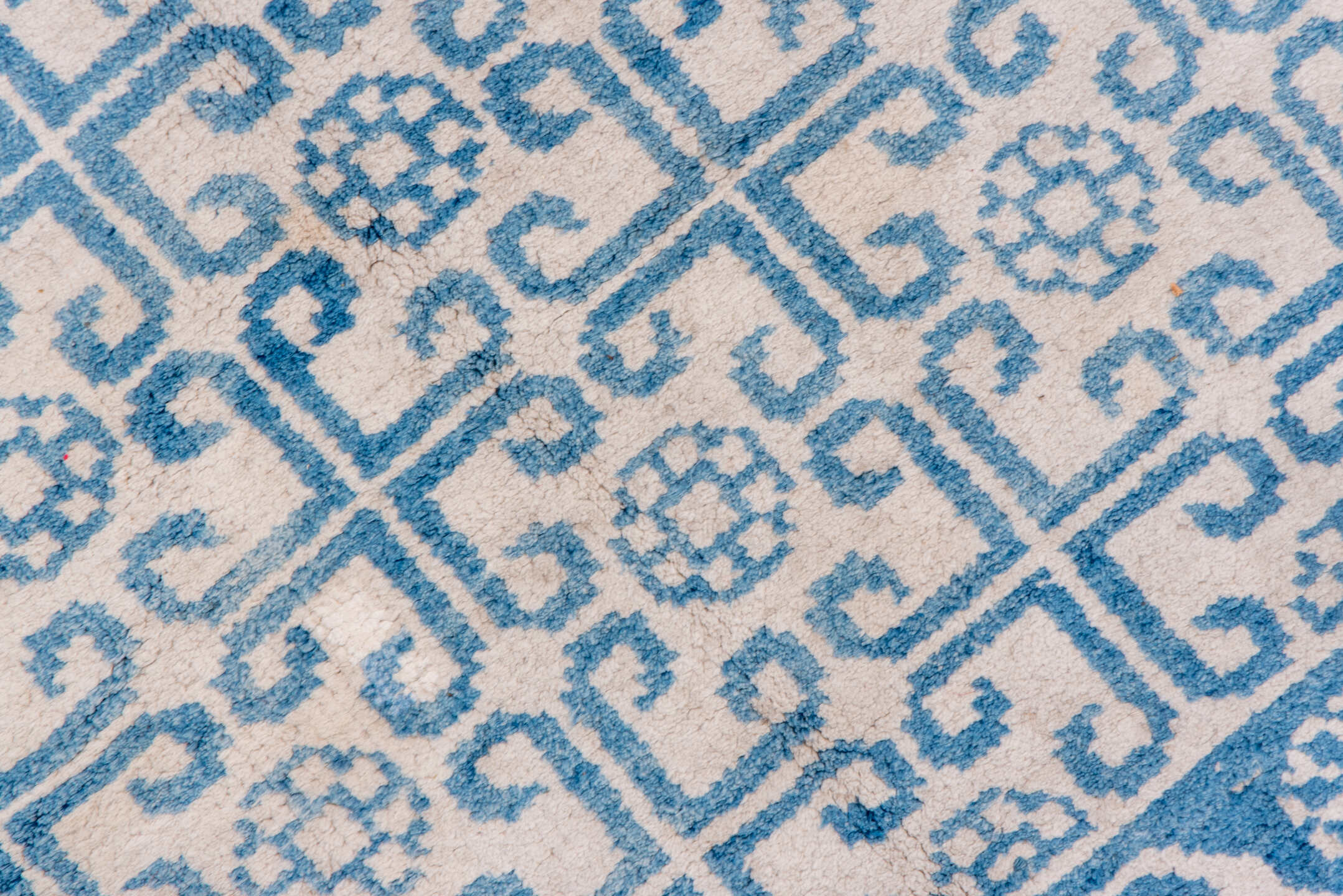 4' x 7' one-of-a-kind handmade vintage Cotton Agra rug. Color palette: ivory, sky blue, azure, slate blue, light blue