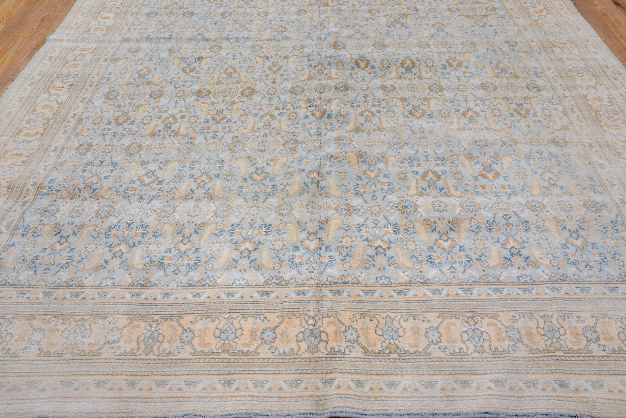 9' x 17' one-of-a-kind handmade vintage Agra rug. Color palette: blue, brown, dark gray, gray, light gray, off-white, orange