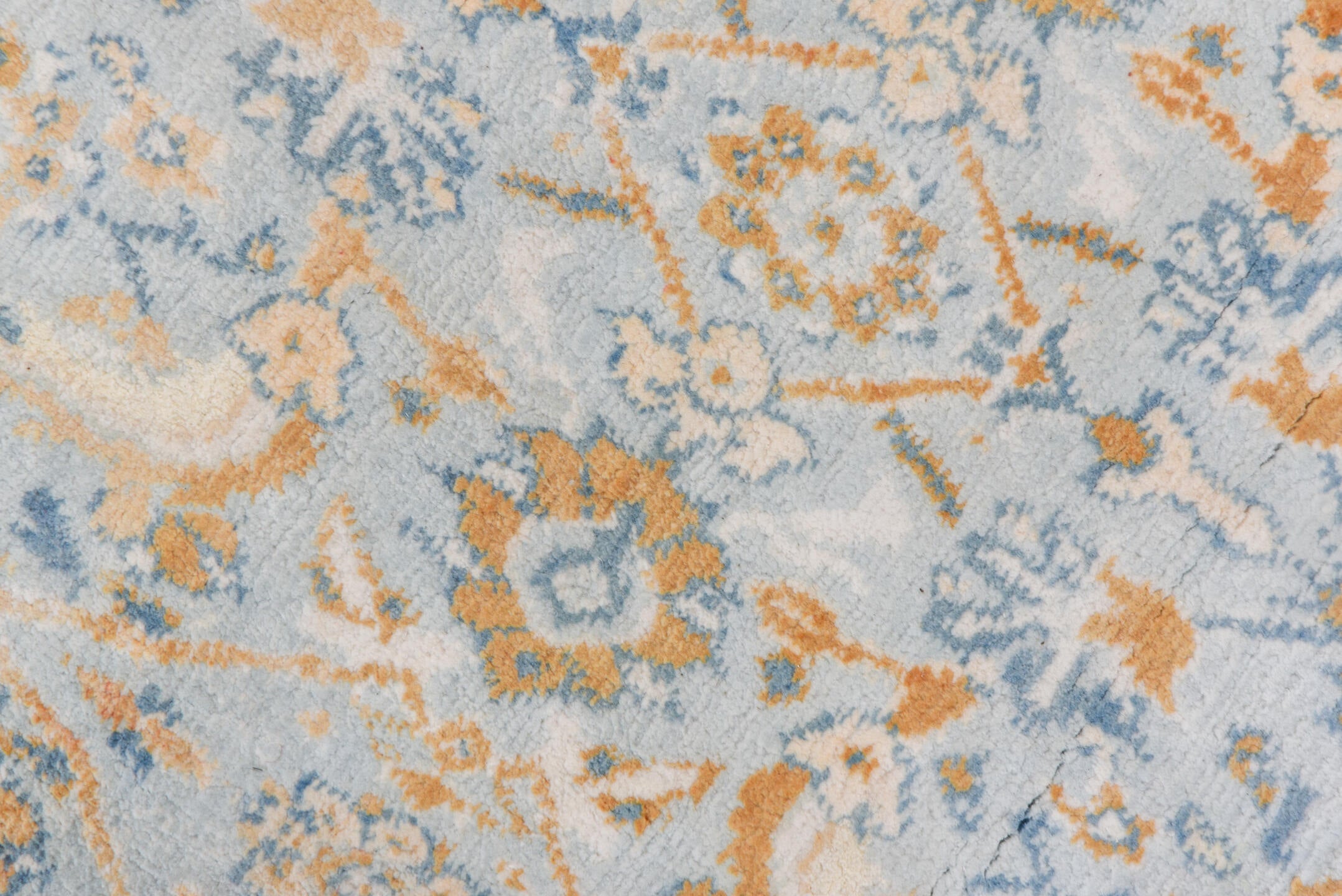 9' x 17' one-of-a-kind handmade vintage Agra rug. Color palette: blue, brown, dark gray, gray, light gray, off-white, orange