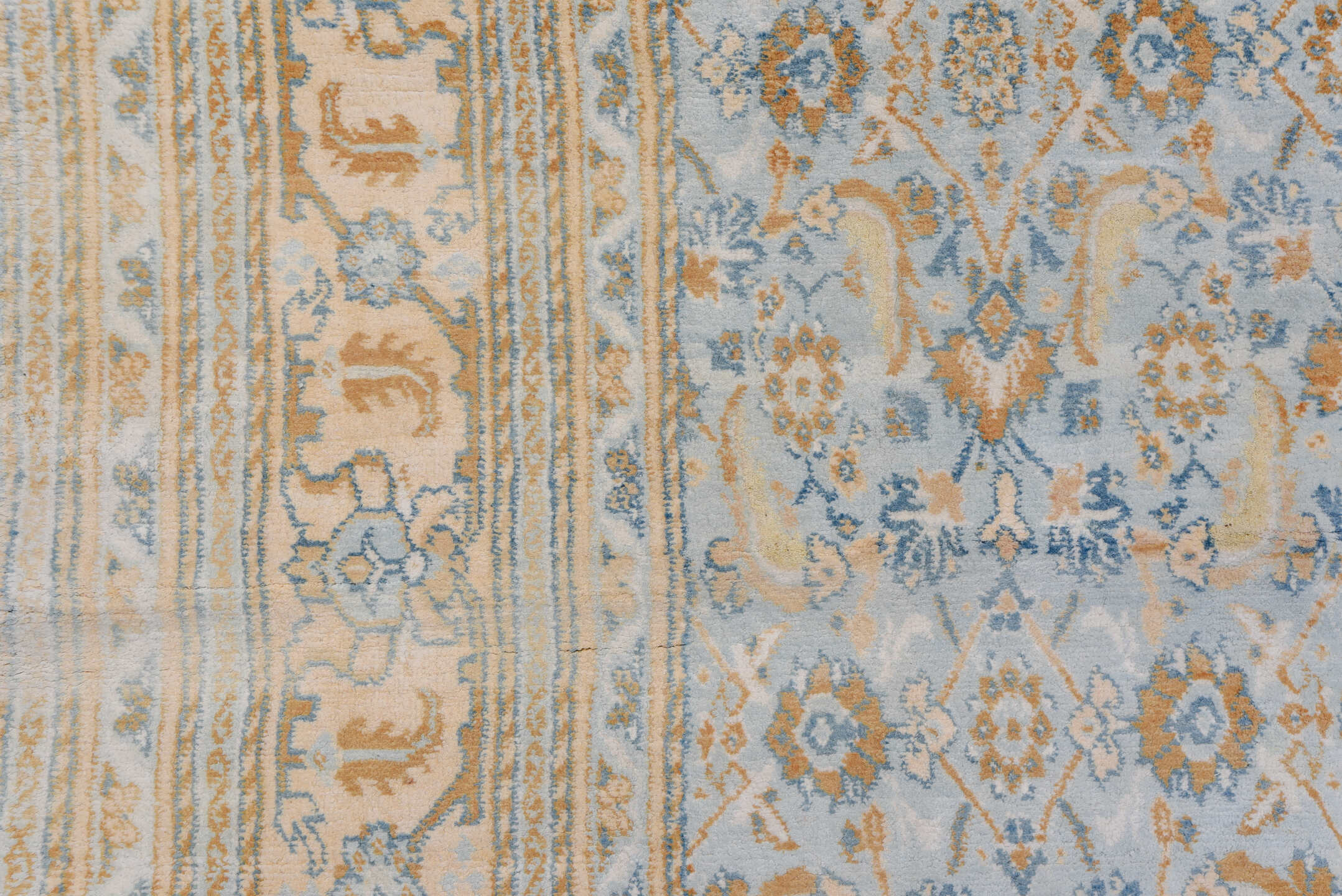 9' x 17' one-of-a-kind handmade vintage Agra rug. Color palette: blue, brown, dark gray, gray, light gray, off-white, orange
