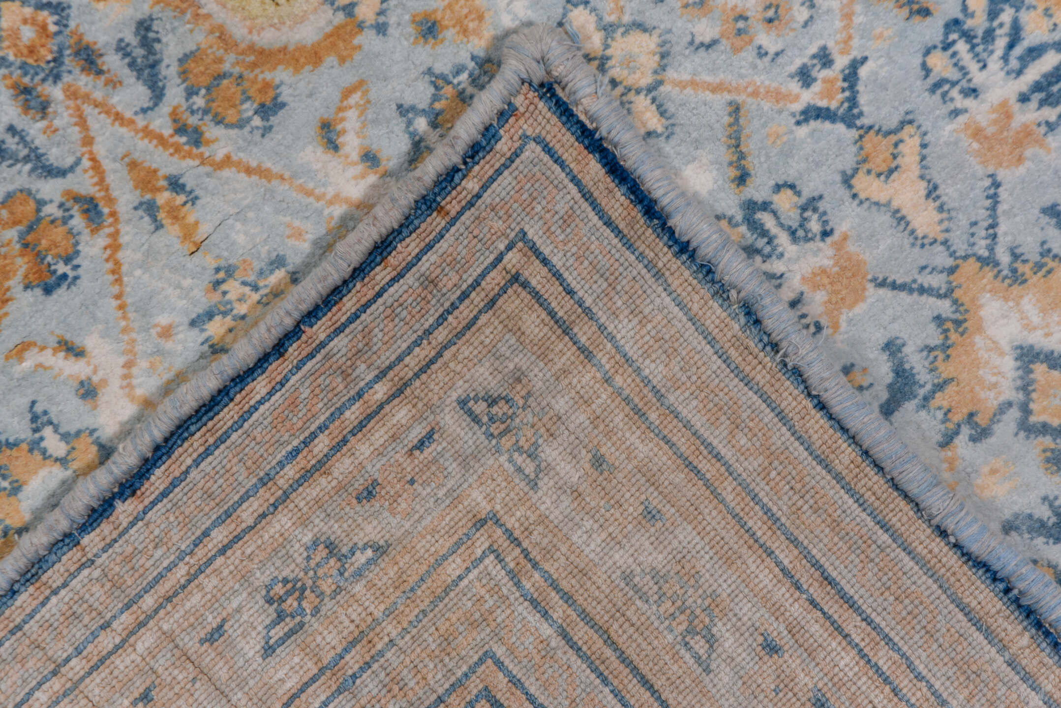 9' x 17' one-of-a-kind handmade vintage Agra rug. Color palette: blue, brown, dark gray, gray, light gray, off-white, orange