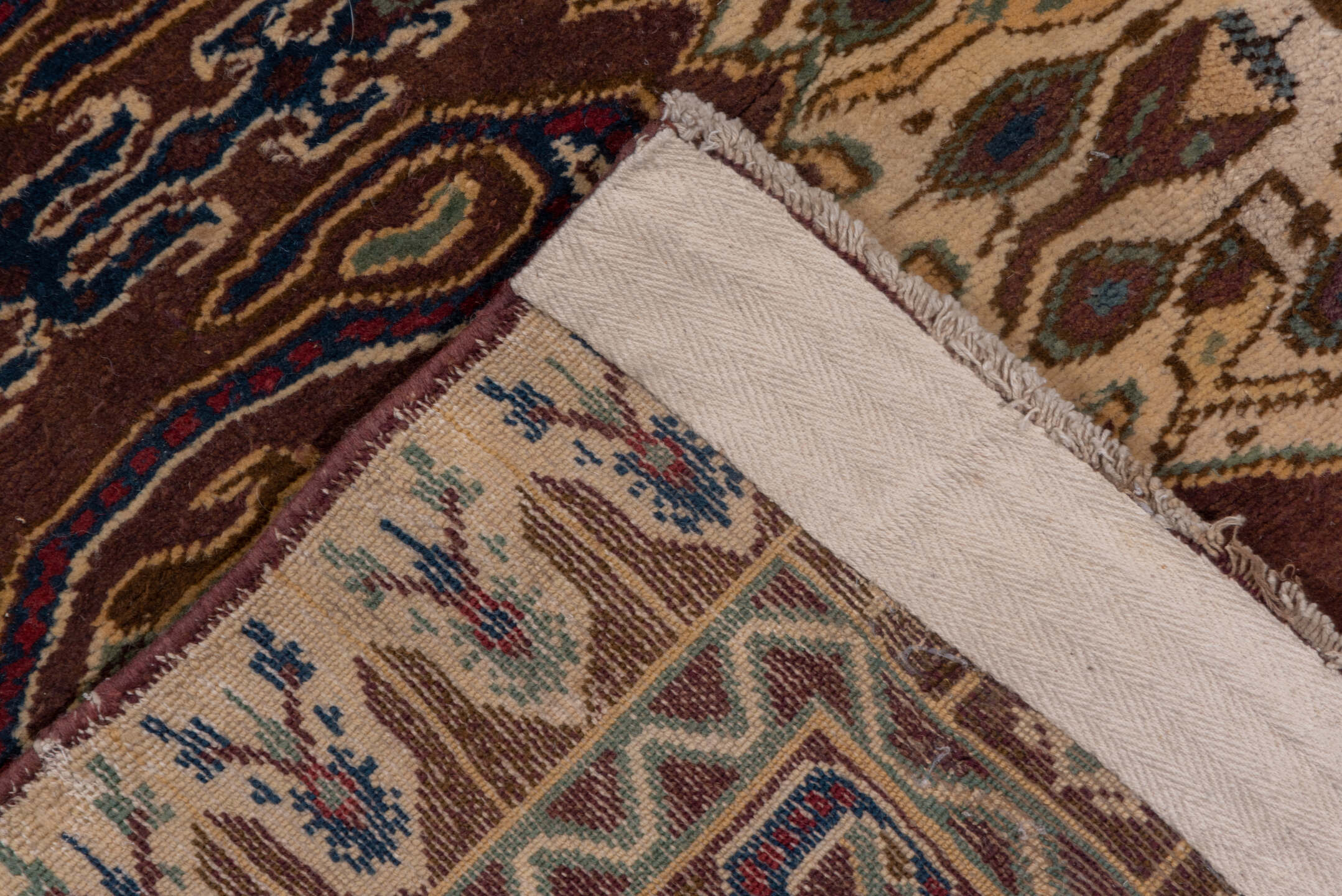 9' x 24' one-of-a-kind handmade vintage Amritzar rug. Color palette: ivory, brown, navy, taupe, rust, gold, blue, beige