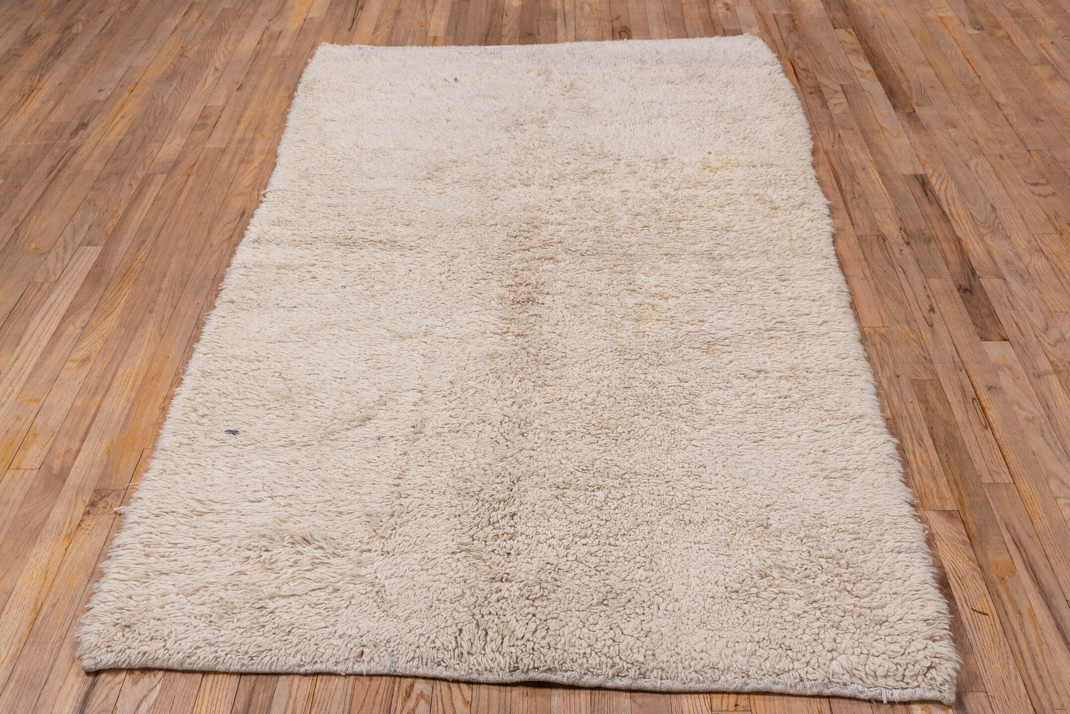 4' x 7' one-of-a-kind handmade vintage Tulu rug. Color palette: brown, gray, light gray, off-white, pink, snow, white