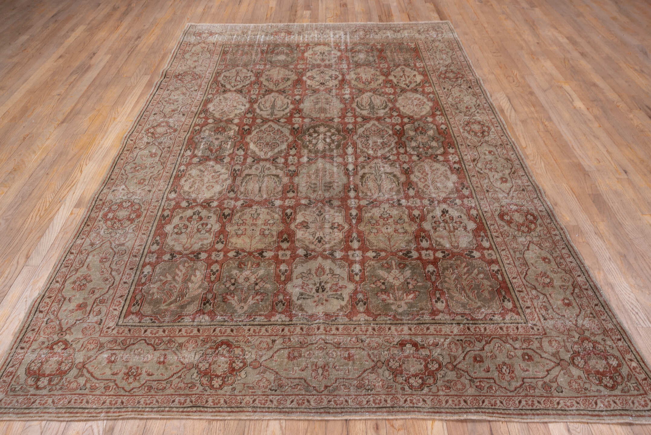 6' x 10' one-of-a-kind handmade antique Tabriz large size rug. Color palette: rust, ivory, taupe, olive, brown, rose