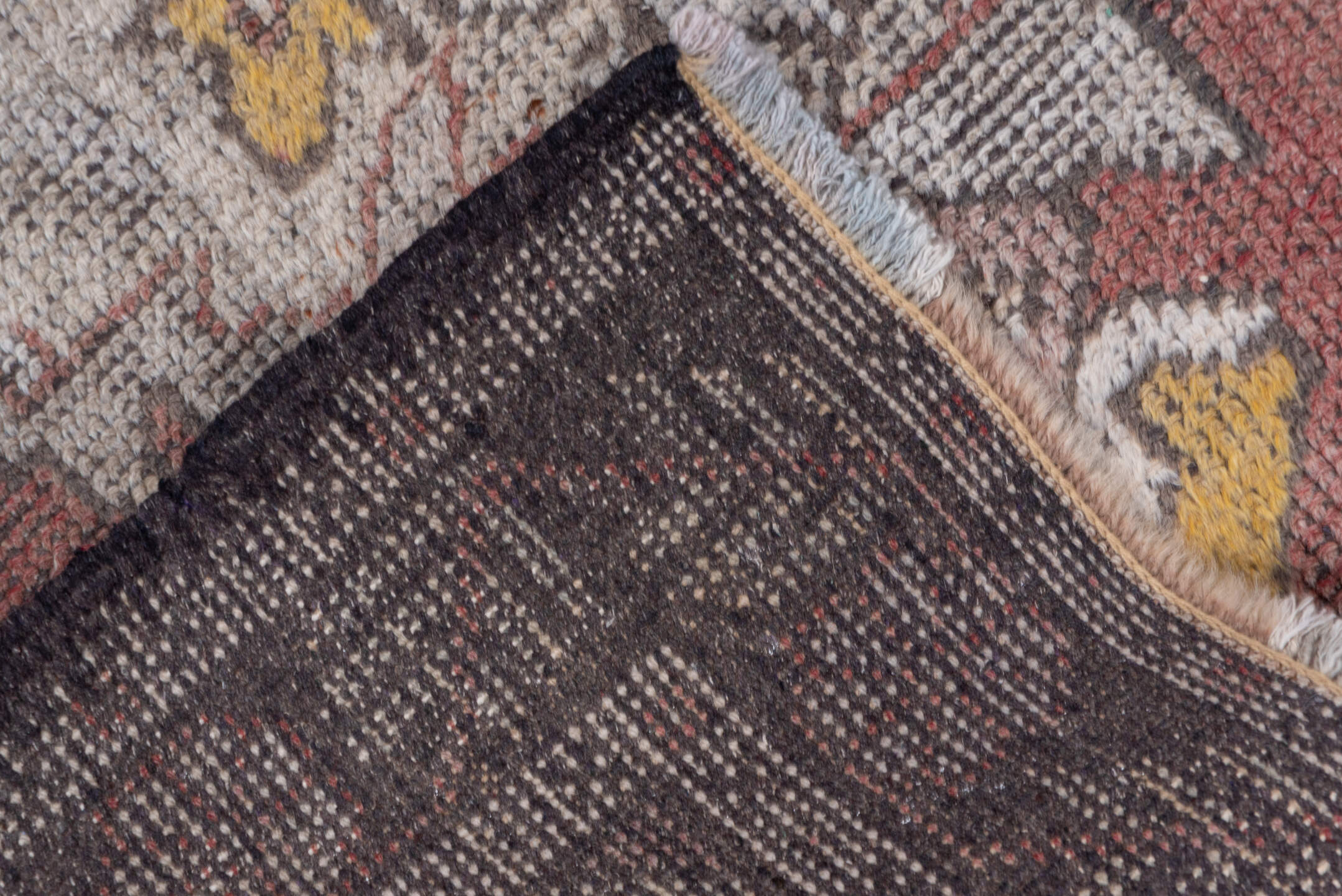 3' x 9' one-of-a-kind handmade vintage Oushak runner rug. Color palette: brown, gray, light gray, pink, silver