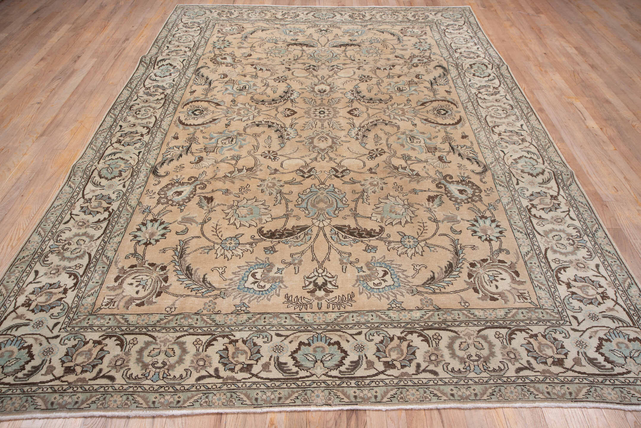 7' x 10' one-of-a-kind handmade vintage Tabriz large size rug. Color palette: beige, ivory, taupe, pale blue, brown, camel