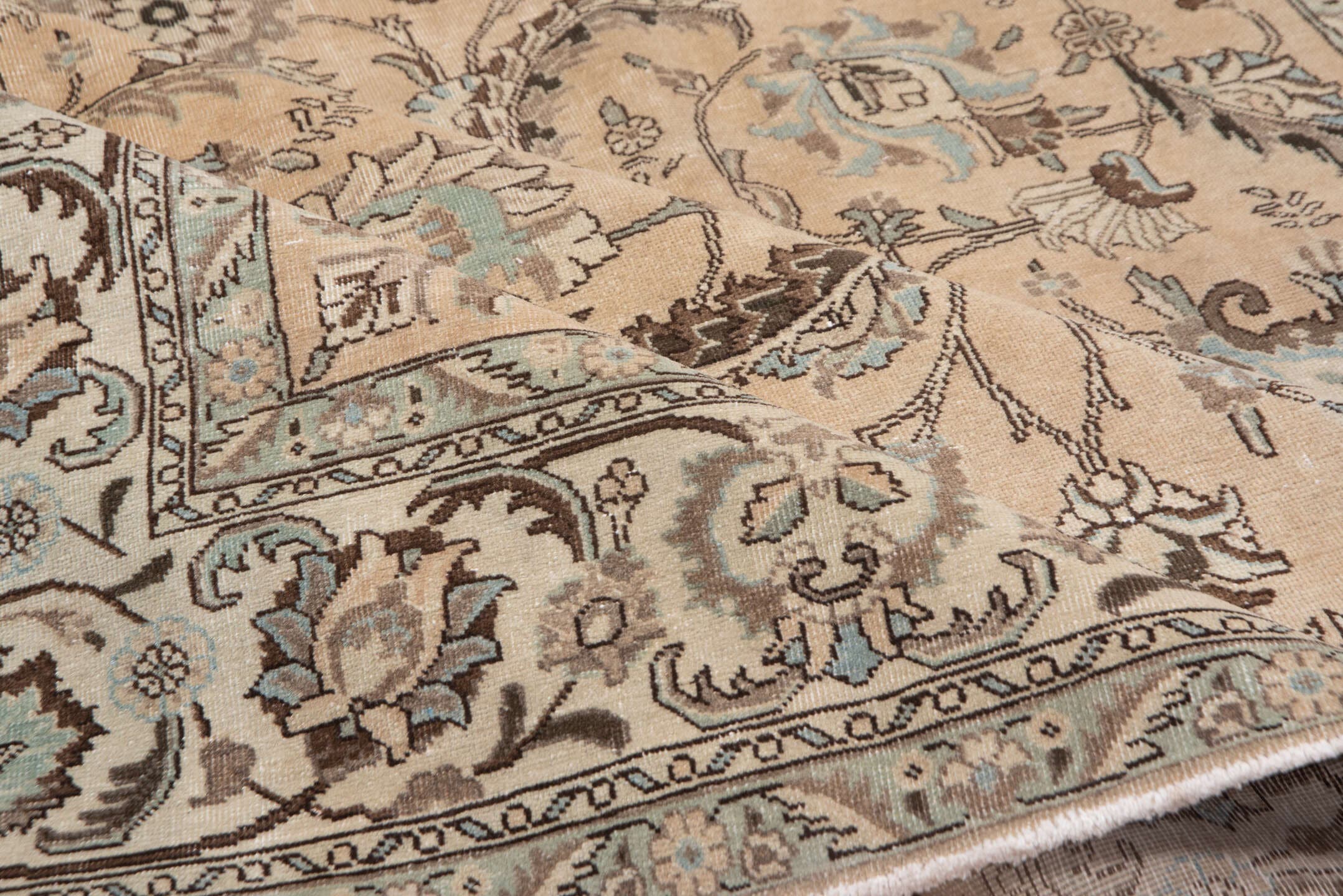 7' x 10' one-of-a-kind handmade vintage Tabriz large size rug. Color palette: beige, ivory, taupe, pale blue, brown, camel