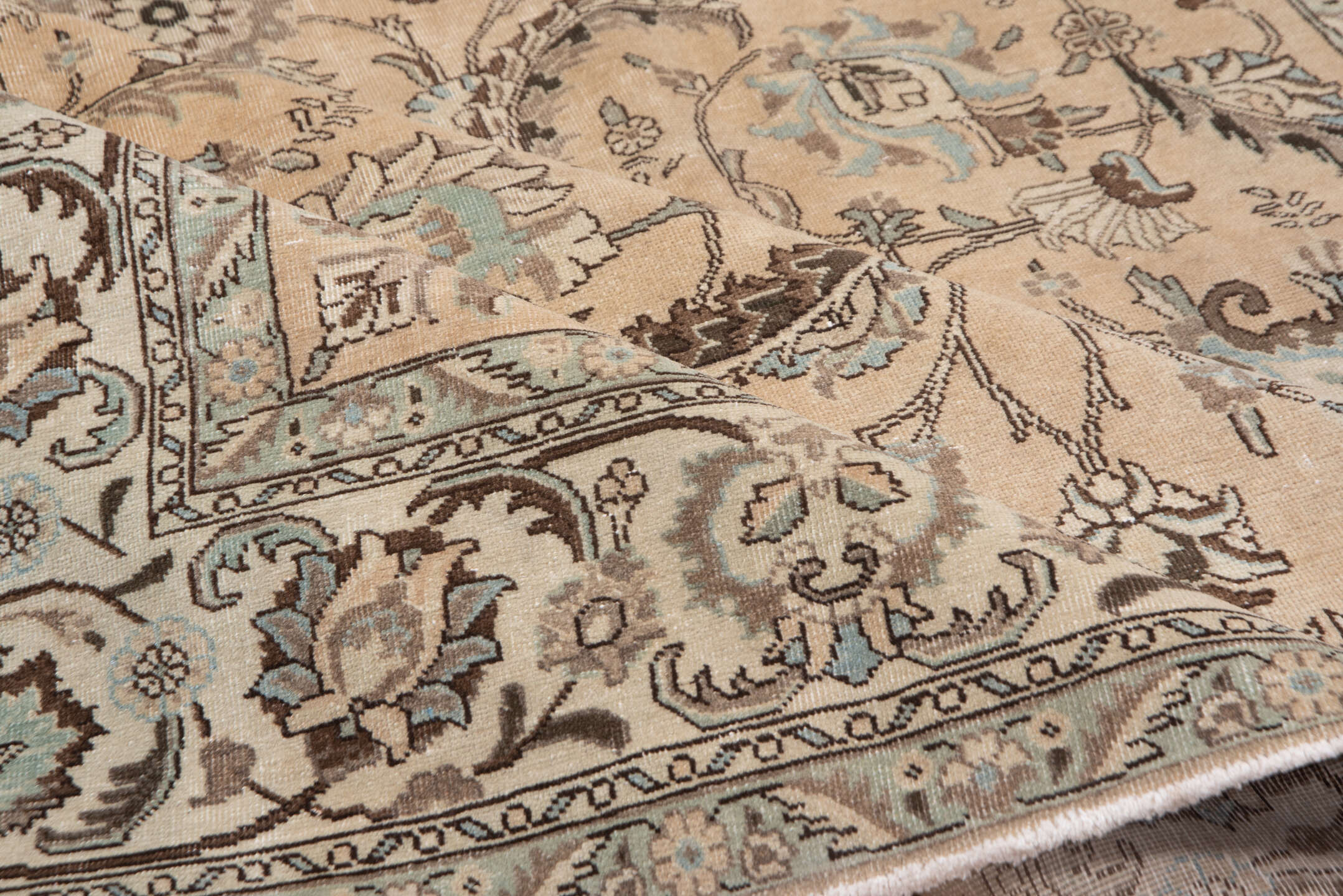 7' x 10' one-of-a-kind handmade vintage Tabriz large size rug. Color palette: beige, ivory, taupe, pale blue, brown, camel
