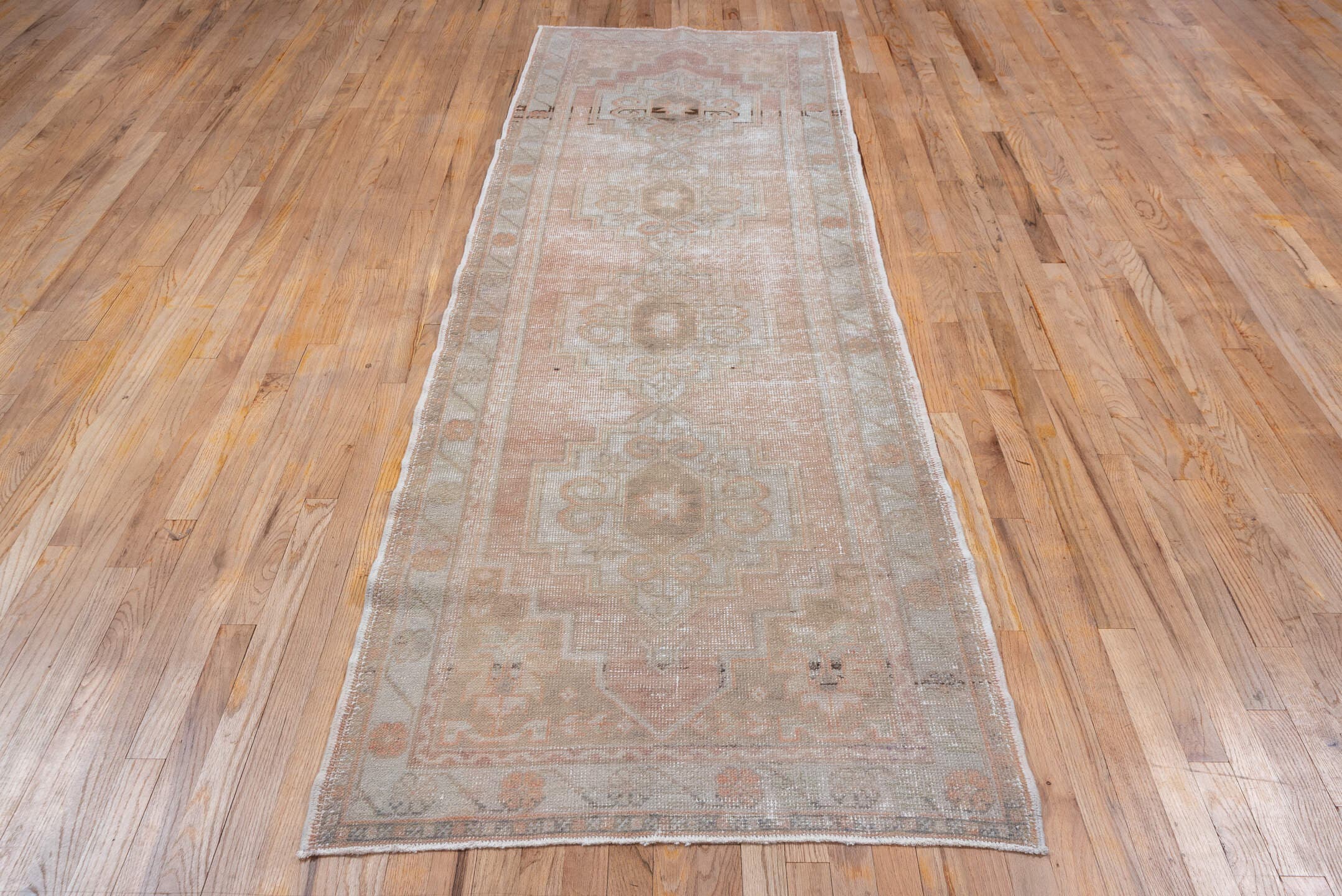 3' x 9' one-of-a-kind handmade vintage Oushak runner rug. Color palette: blush, ivory, taupe, beige, camel, charcoal, pink