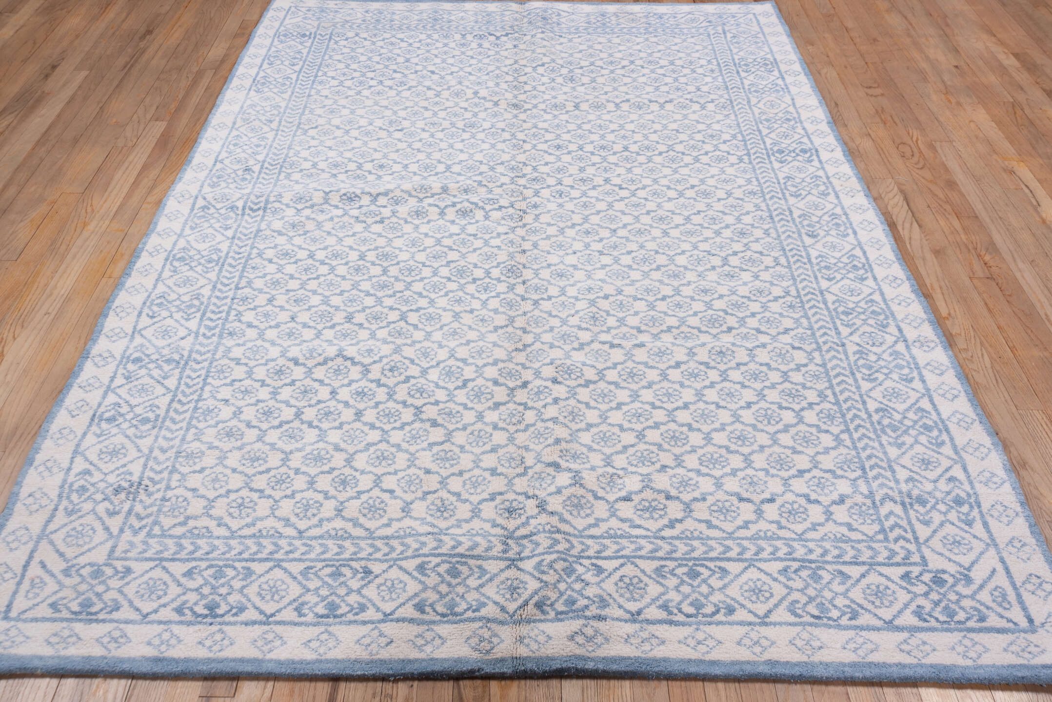 6' x 9' one-of-a-kind handmade vintage Cotton Agra medium size rug. Color palette: ivory, sky blue, powder blue, light blue