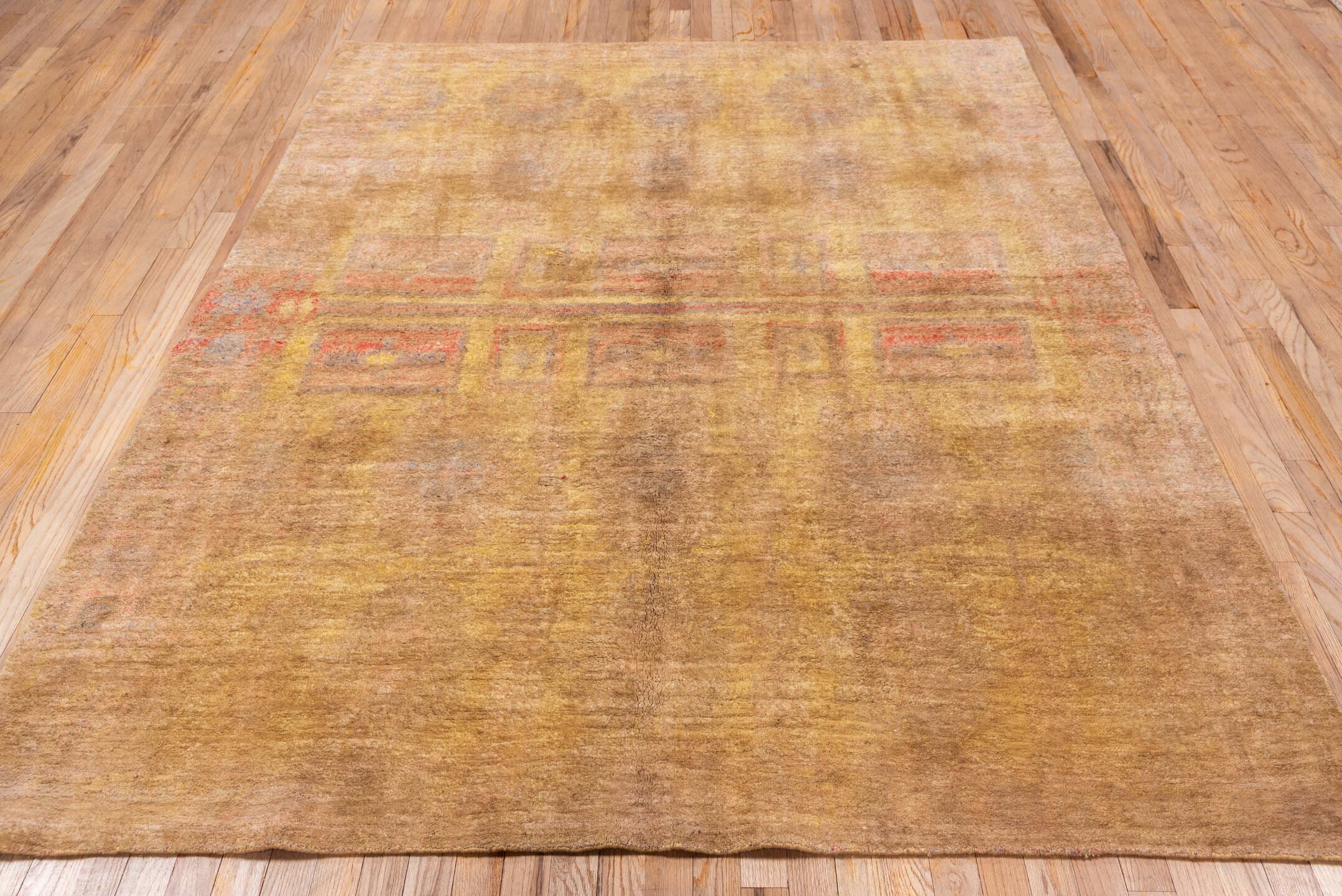 6' x 8' one-of-a-kind handmade antique Cotton Agra medium size rug. Color palette: camel, taupe, gold, terra cotta, rose