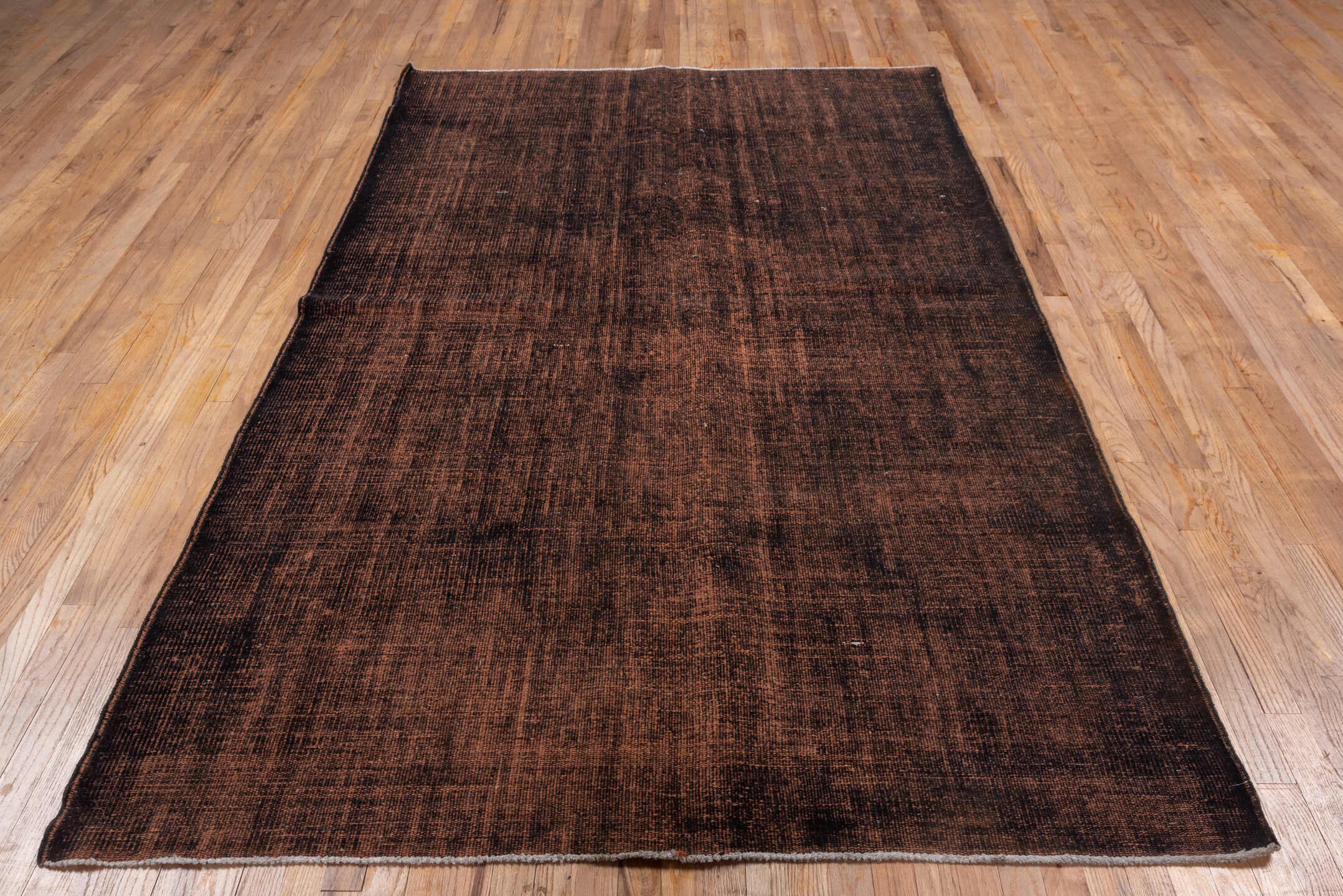 5' x 9' one-of-a-kind handmade vintage Overdyed medium size rug. Color palette: black, brown, gray, light gray, off-white