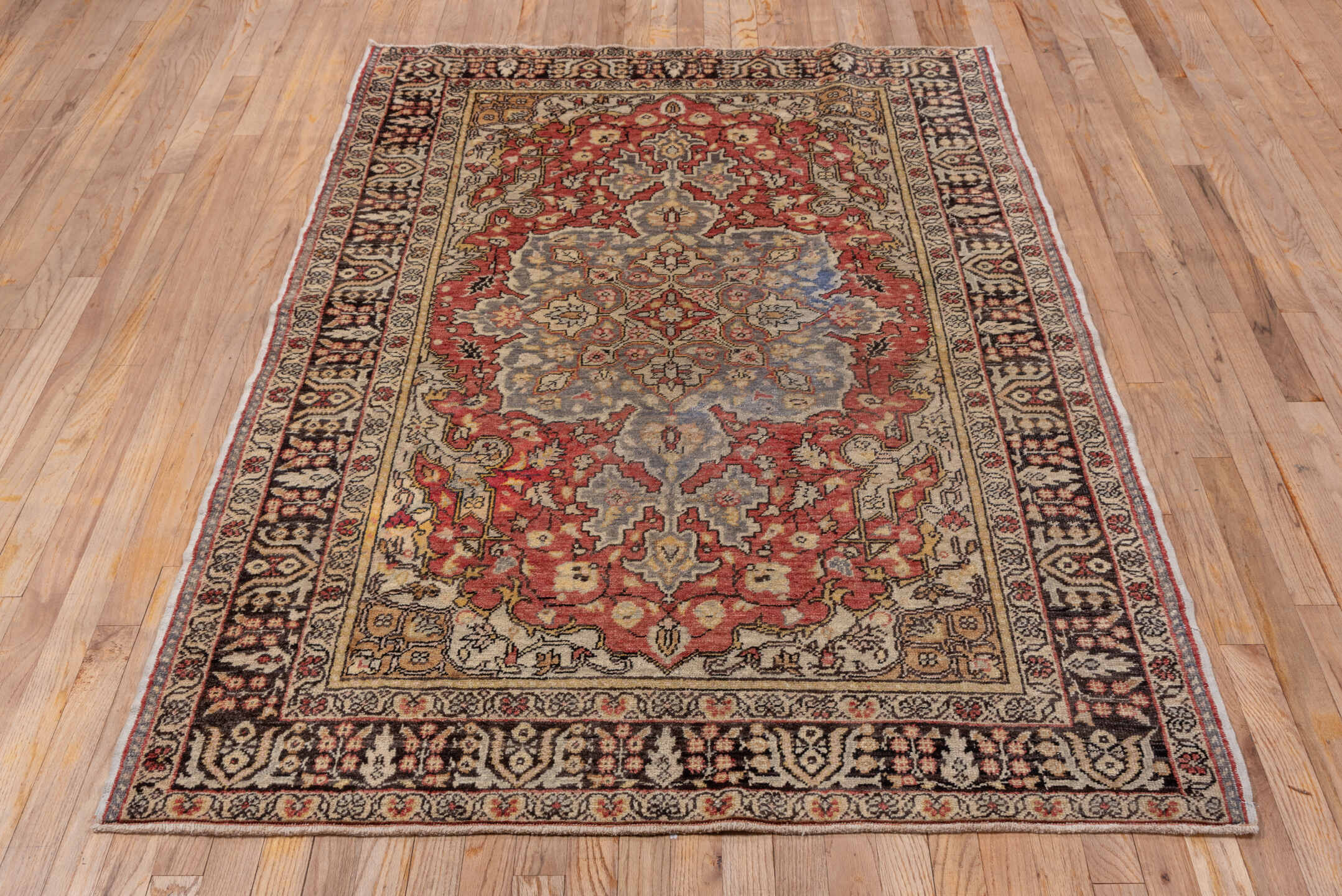 4' x 6' one-of-a-kind handmade vintage Oushak small size rug. Color palette: ivory, rust, blue-gray, charcoal, rose, taupe