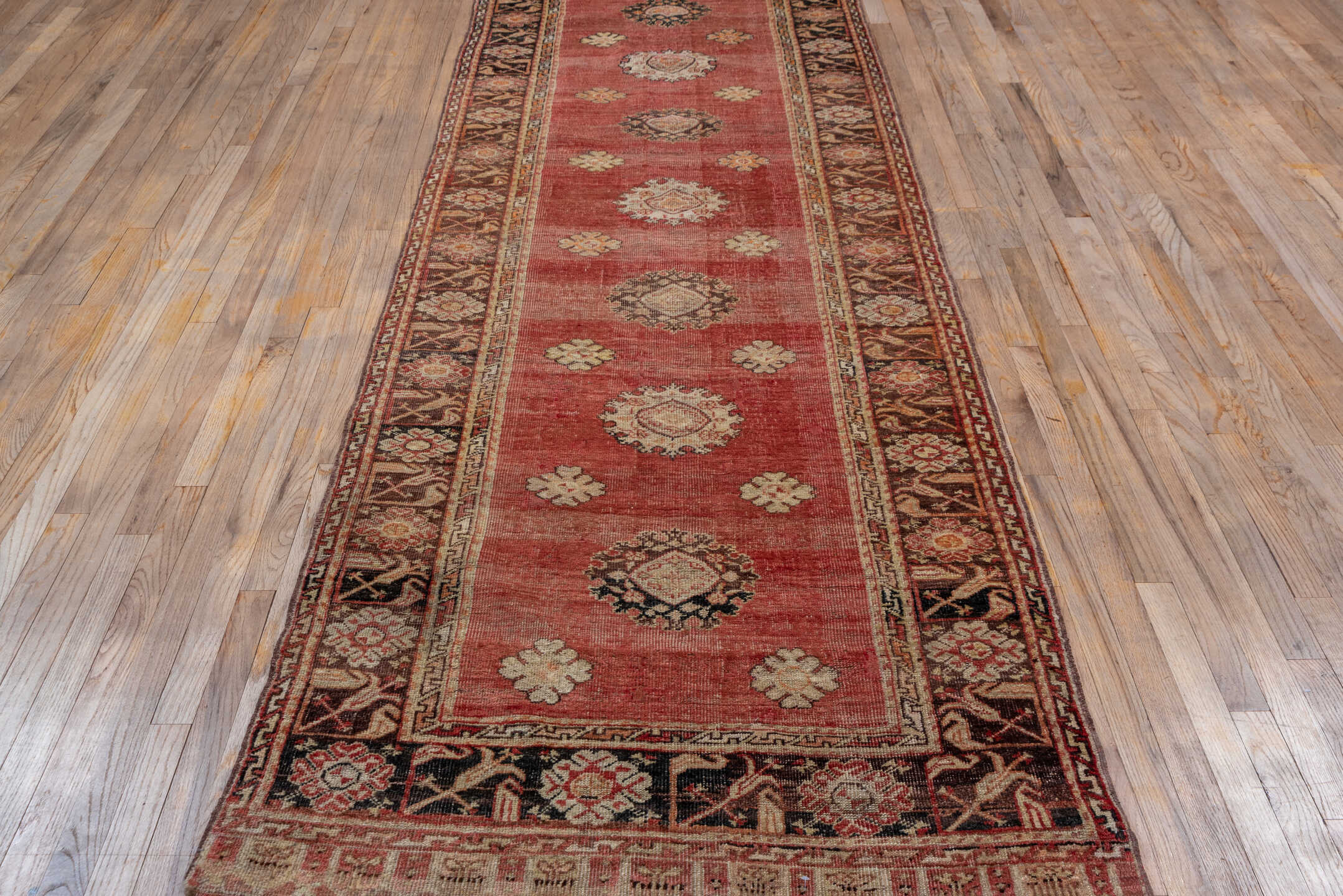 3' x 11' one-of-a-kind handmade vintage Oushak runner rug. Color palette: rose, burgundy, ivory, blush, charcoal, taupe