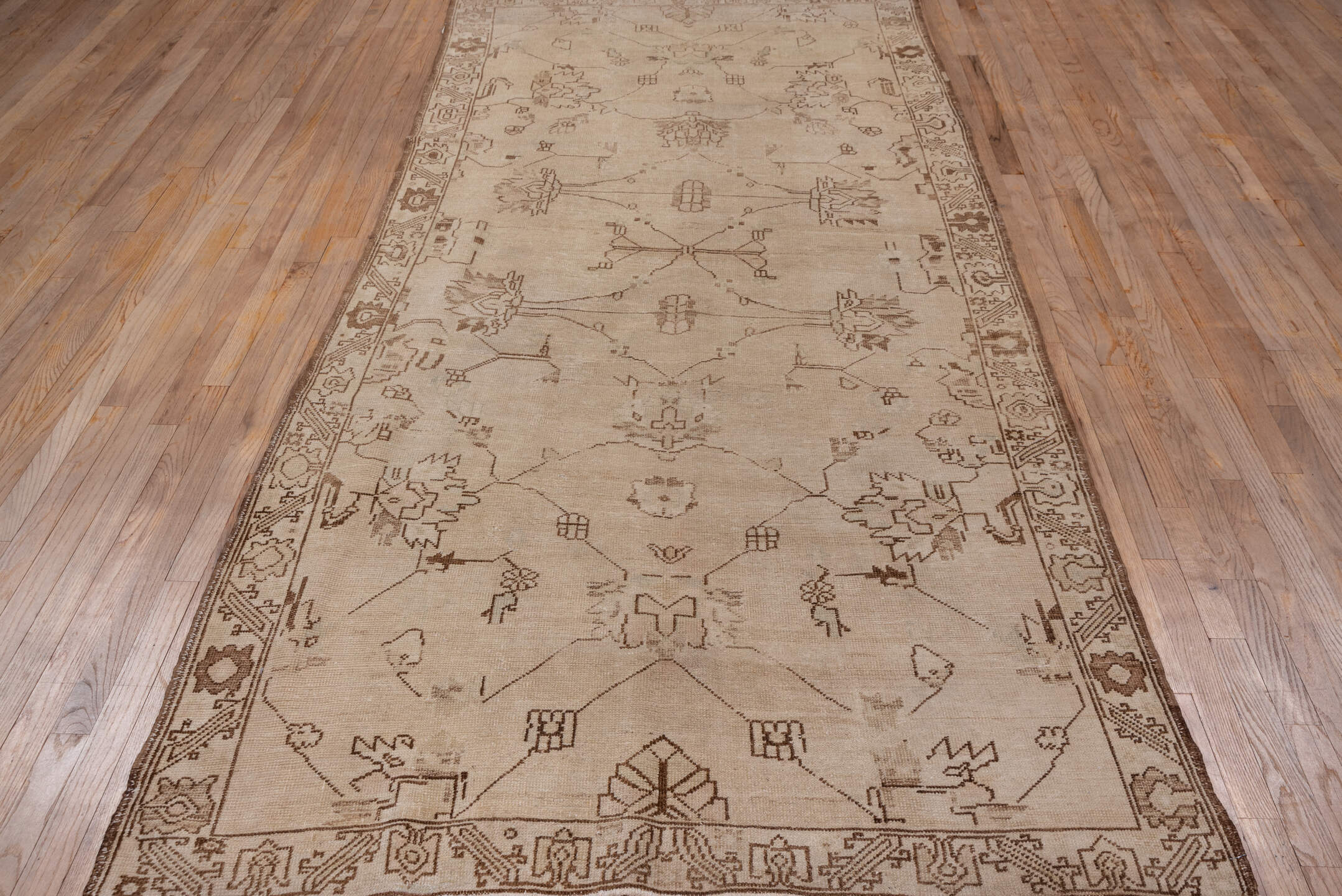 4' x 10' one-of-a-kind handmade vintage Oushak runner rug. Color palette: brown, gray, light gray, off-white, pink, snow
