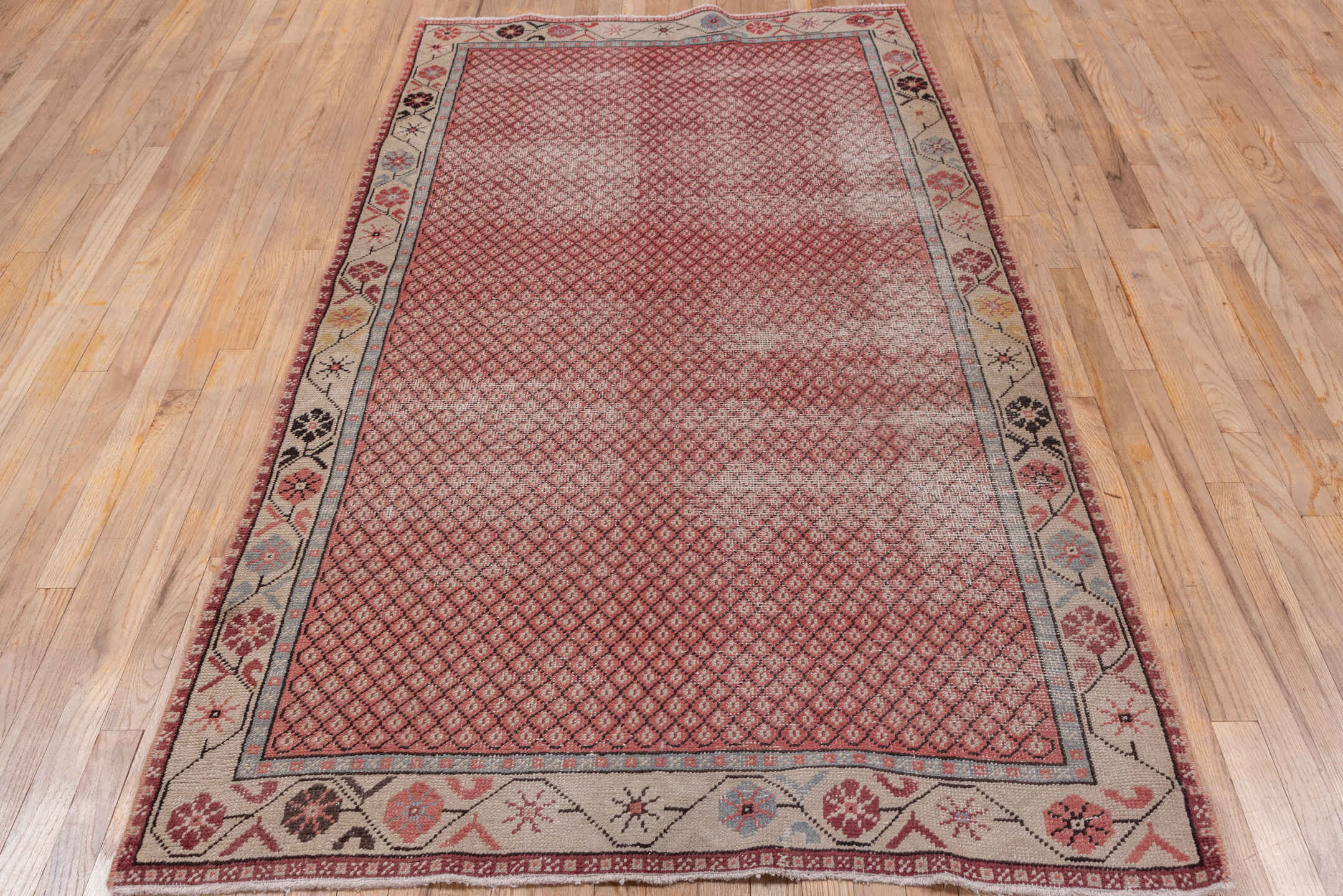 4' x 7' one-of-a-kind handmade vintage Oushak rug. Color palette: rose, ivory, dusty blue, charcoal, gold, crimson, pink