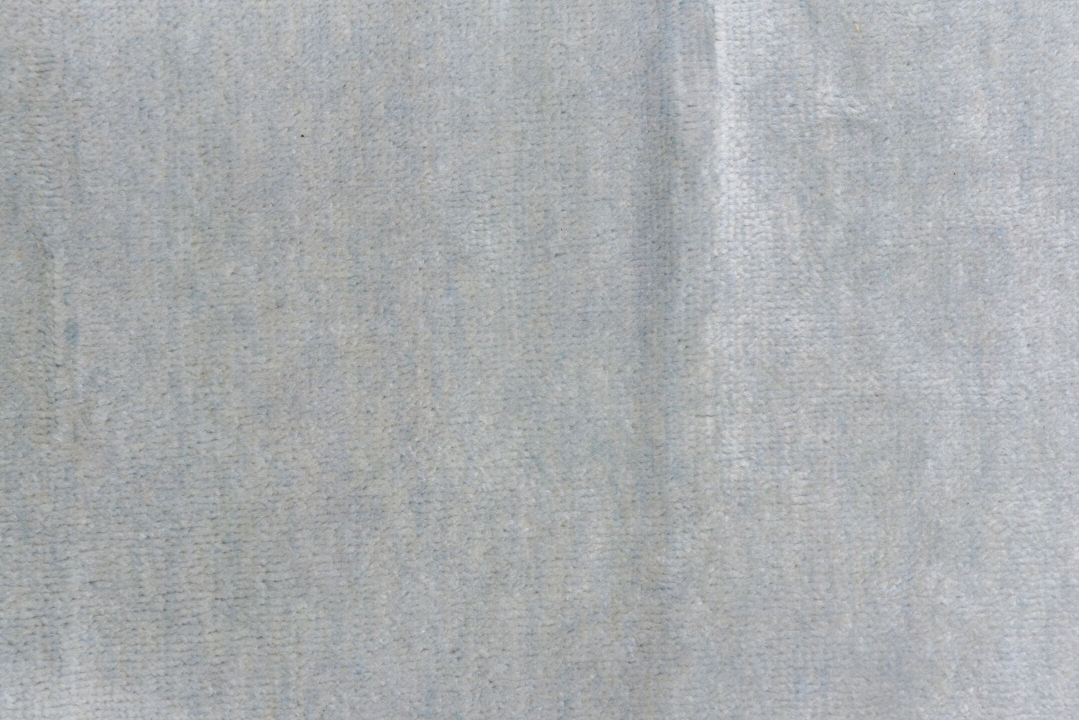 9' x 12' one-of-a-kind handmade vintage Rad large size rug. Color palette: ivory, pale blue, cream, taupe, light blue, beige